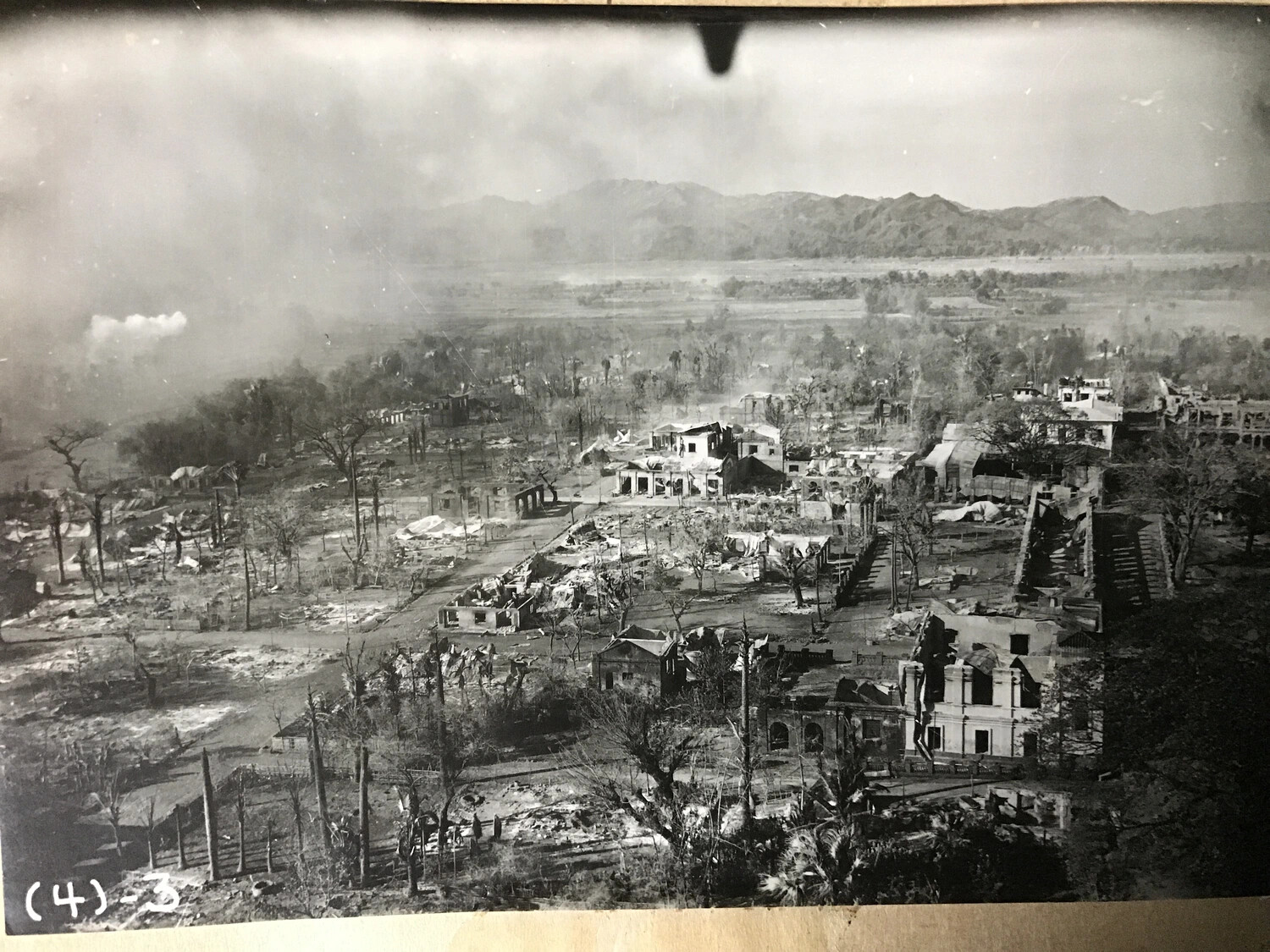 Strike Photograph: Destroyed Philippine Town, Luzon Campaign, 312th Bomb Group (Sequence Frame 4-3)