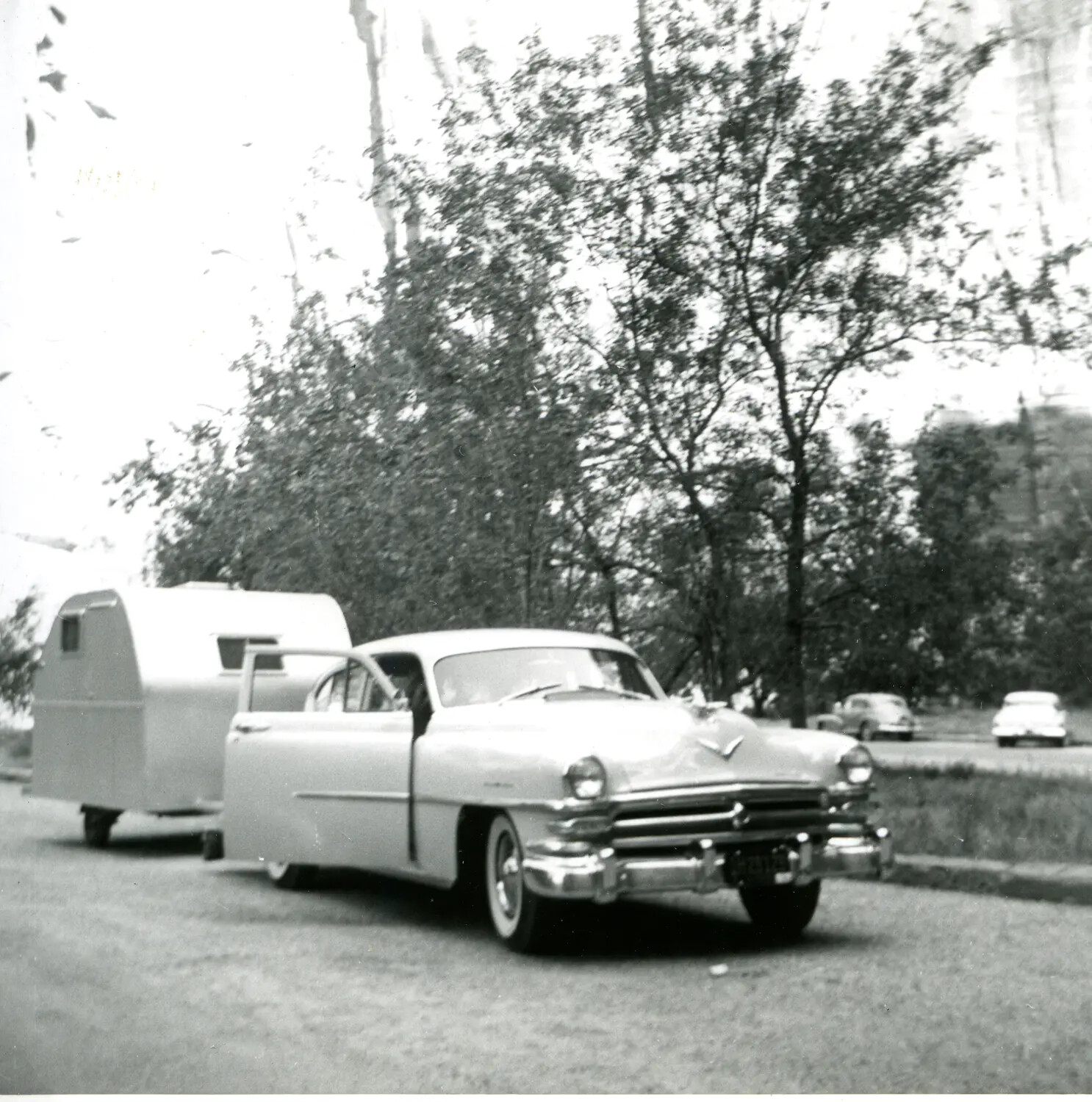 Automobile Towing a Teardrop Camper Trailer, Postwar Family Snapshot, c. mid-1950s