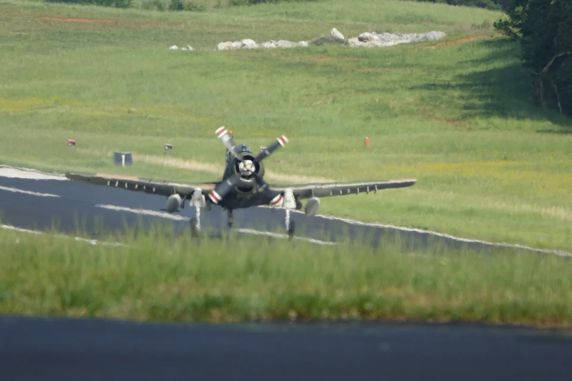 Douglas A-1 Skyraider in Dark Navy-Style Finish, Head-On at Low Level on a Runway, 3-4 May 2019 Event