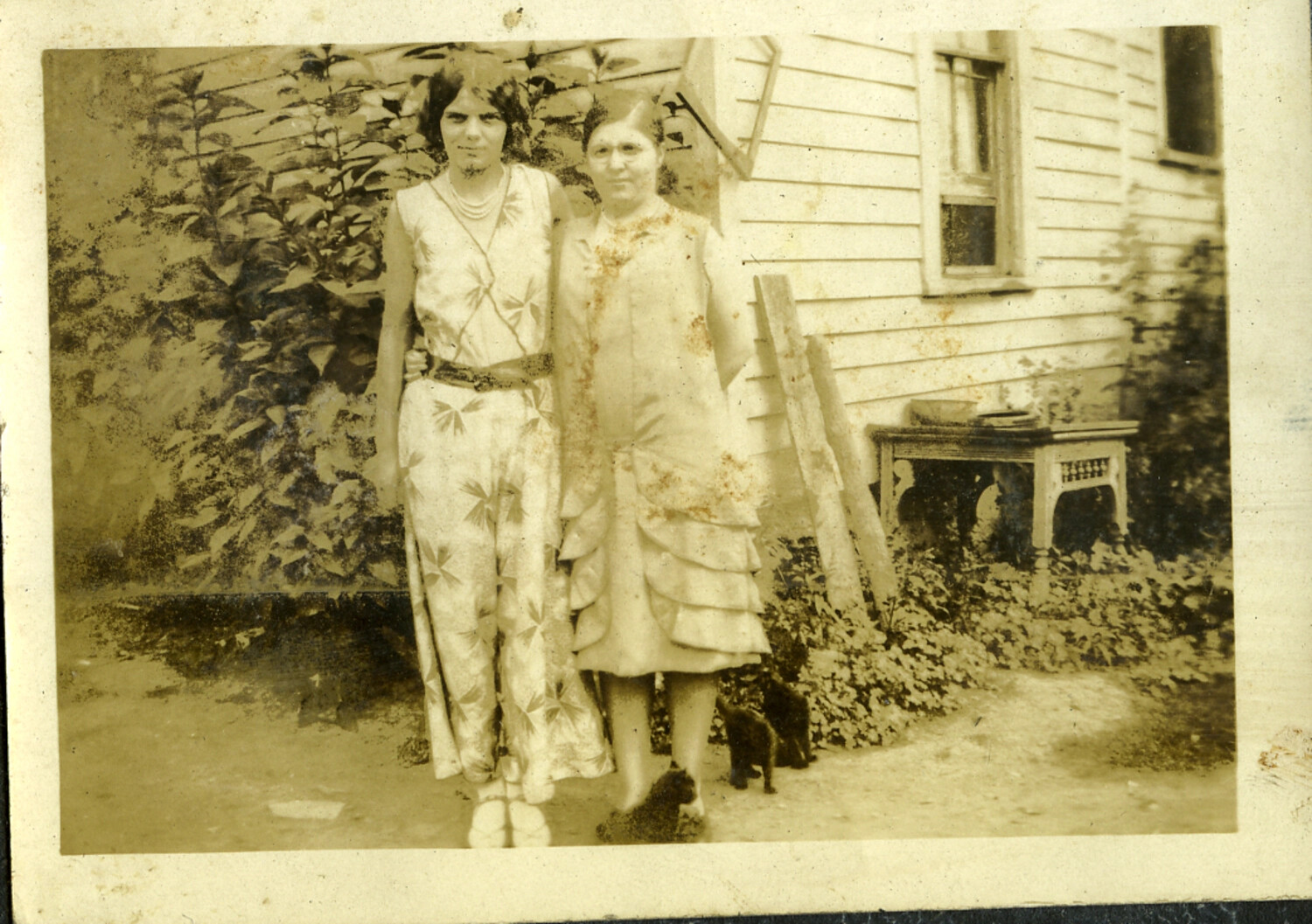 Two Women in a Backyard with Cats, Manila Photo Album