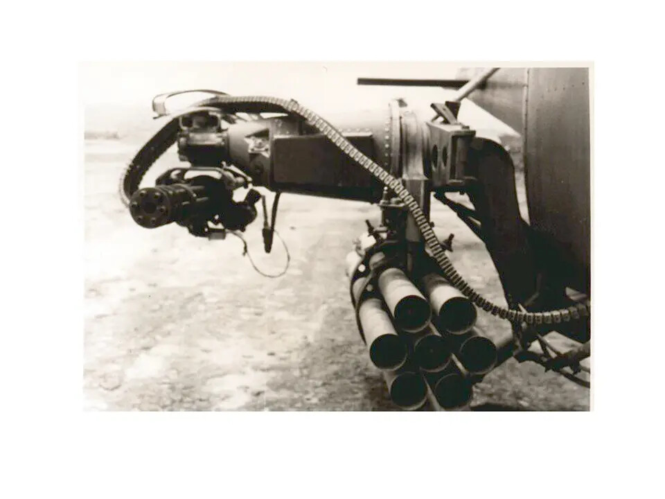 Close-Up of Minigun Pod and Rocket Pod Ordnance on Wing Pylon, Vietnam War Attack Aircraft