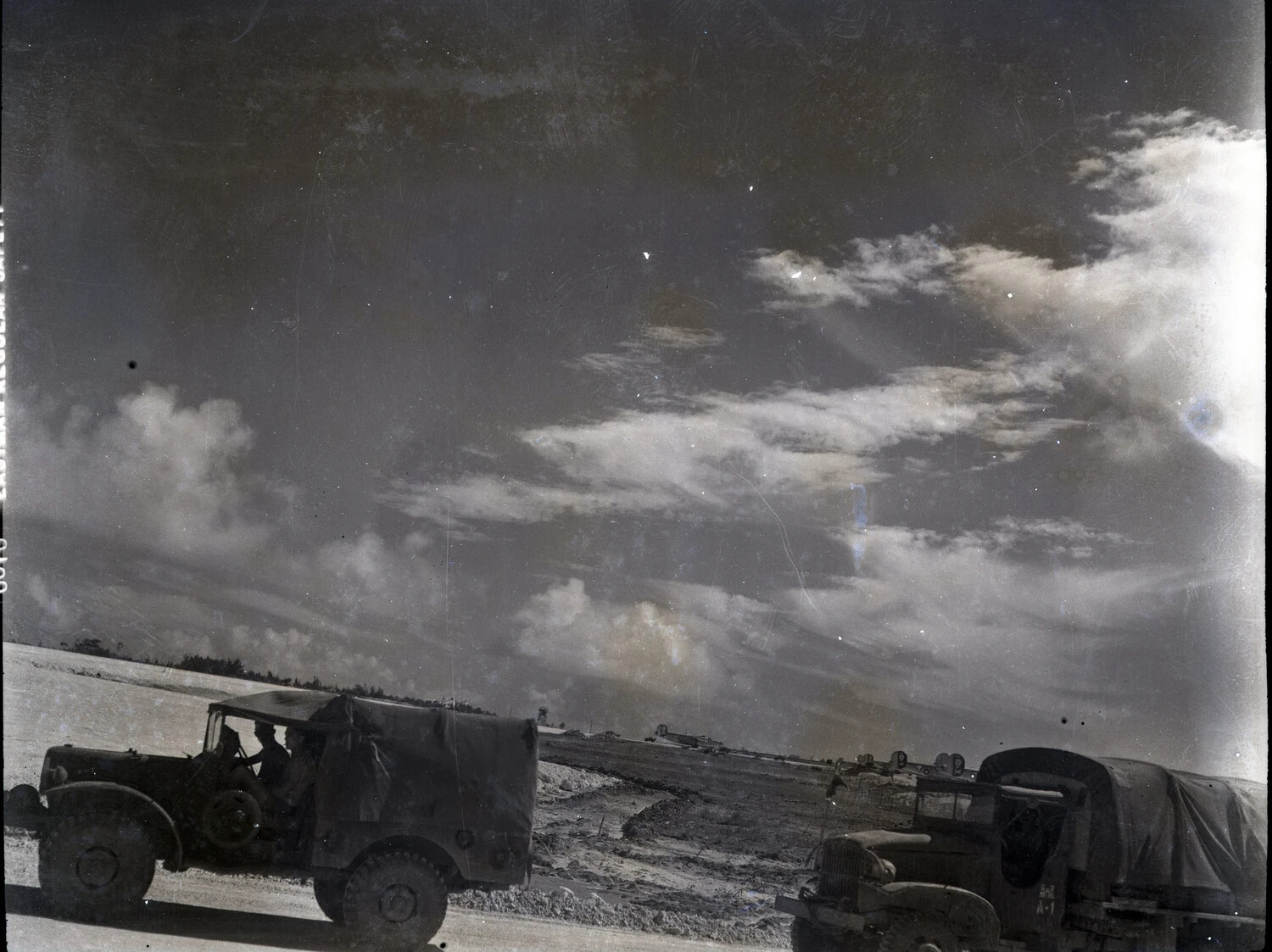 Military Vehicles on the Airfield Road, Ie Shima, 345th Bombardment Group