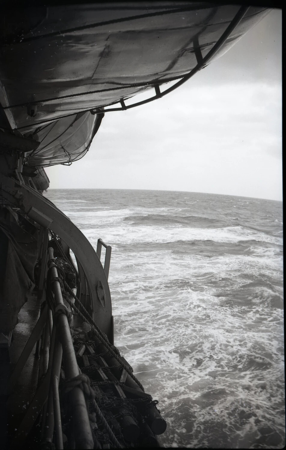 Rough Seas Viewed from a Ship's Deck, Canvas-Covered Equipment Overhead