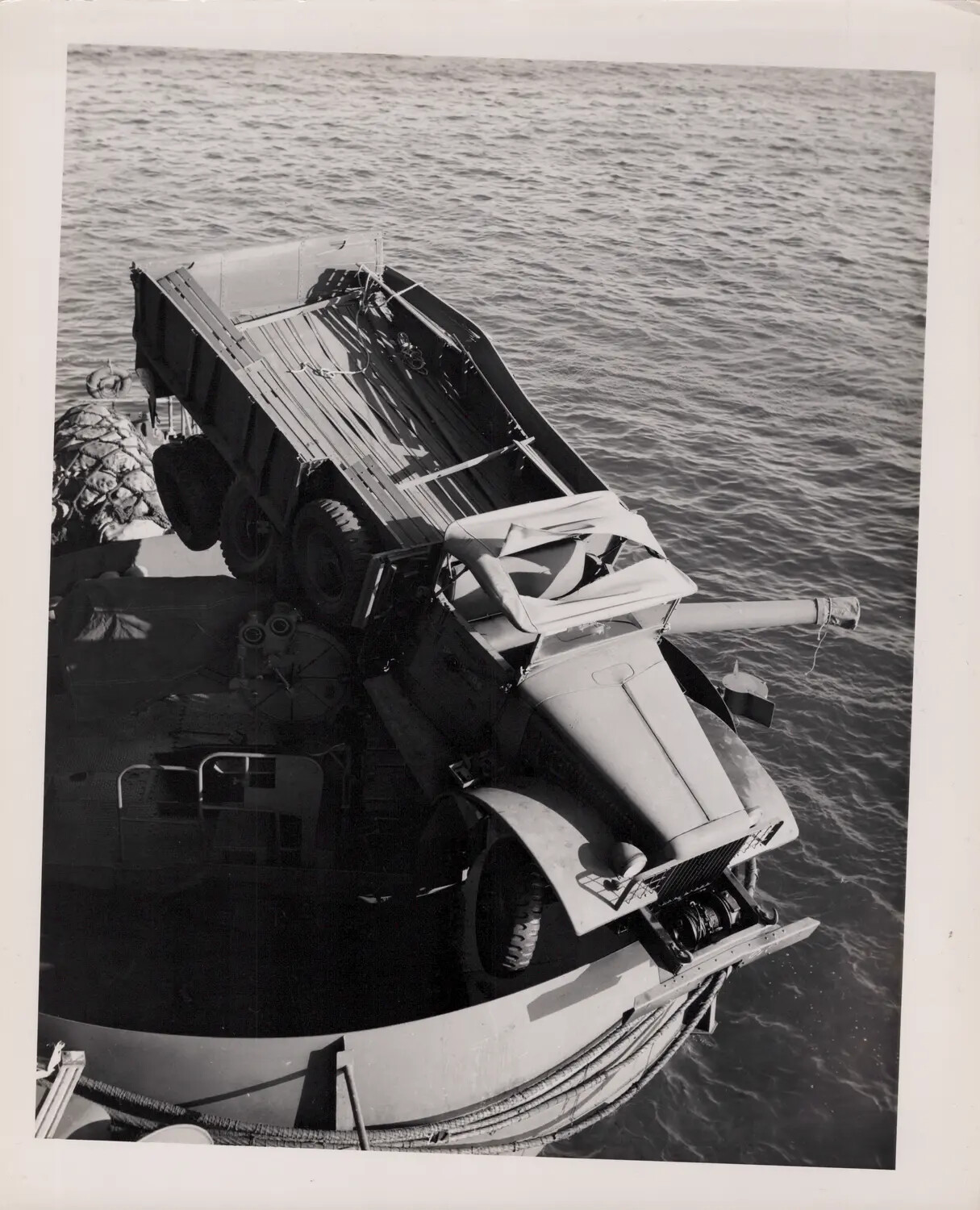 Cargo Truck Overhanging the Bow of U.S.S. Petrof Bay (CVE-80), August 21, 1945
