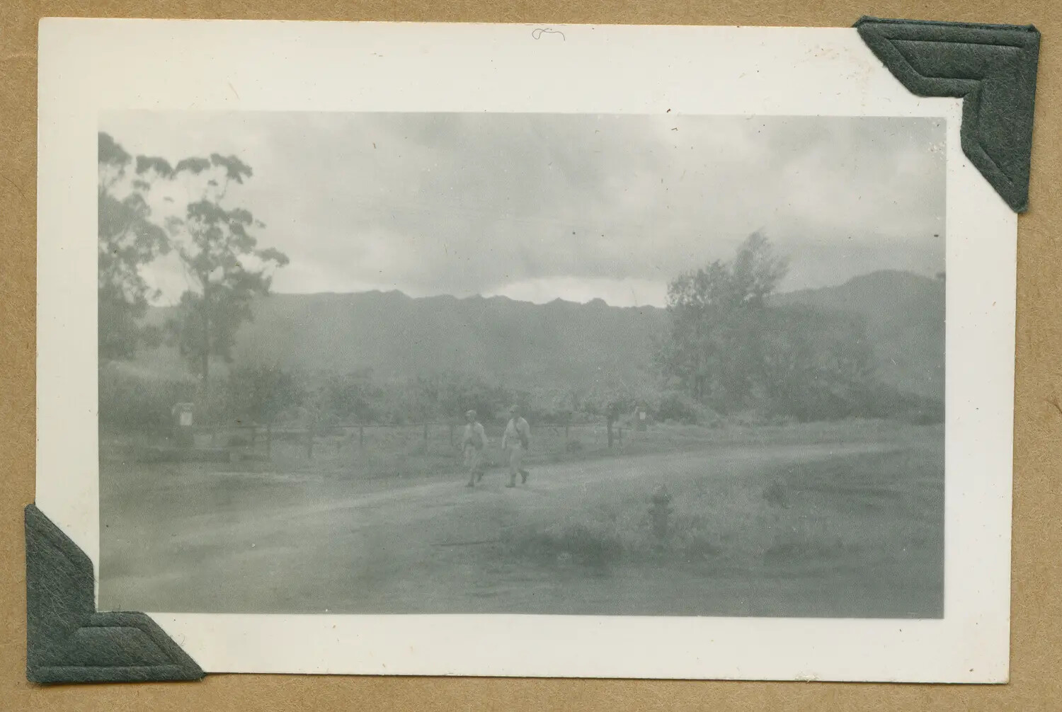 Two Soldiers Walking Across a Field, Army Post, Oahu, Hawaii Territory, WWII Era