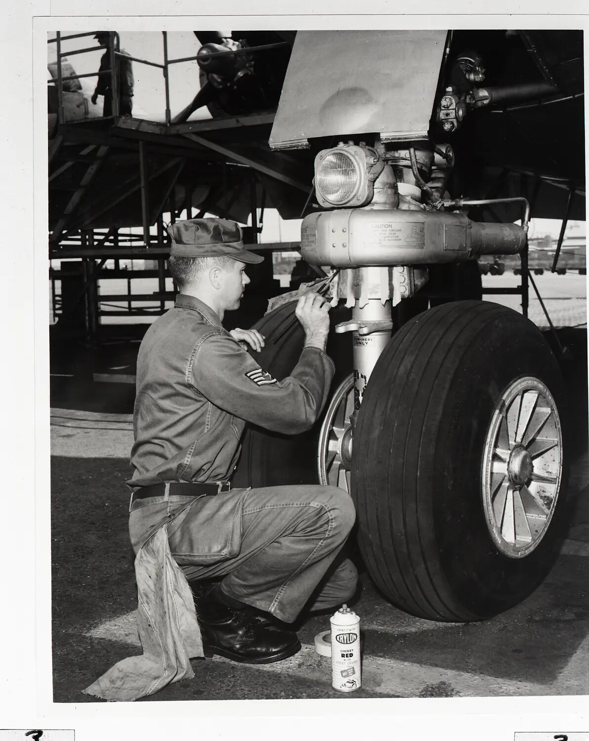 California Air National Guard Sergeant Servicing Main Landing Gear, 146th Air Transport Wing, 1960