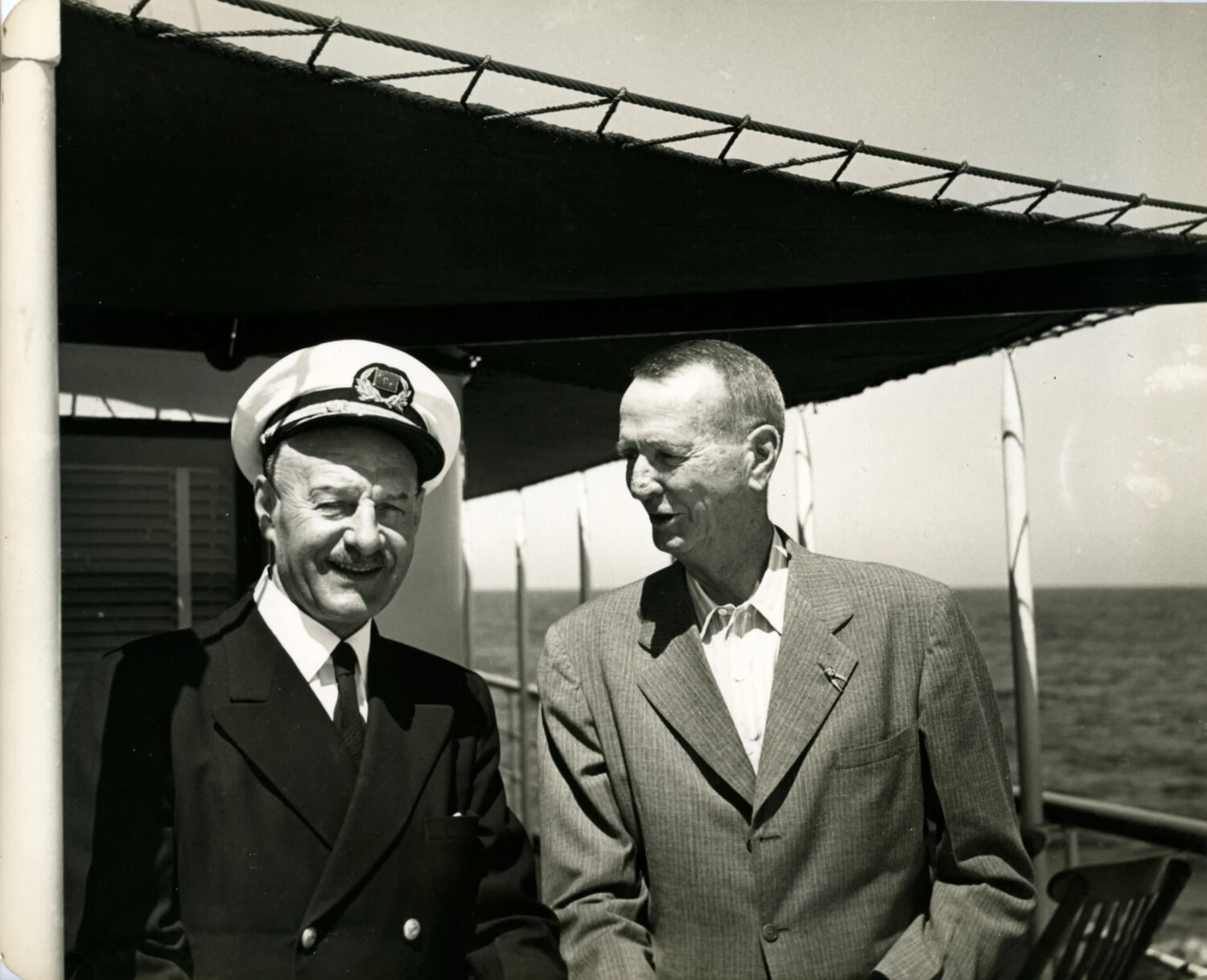 Ship's Captain and Passenger on Deck, Wainwright Travel Album, circa 1949
