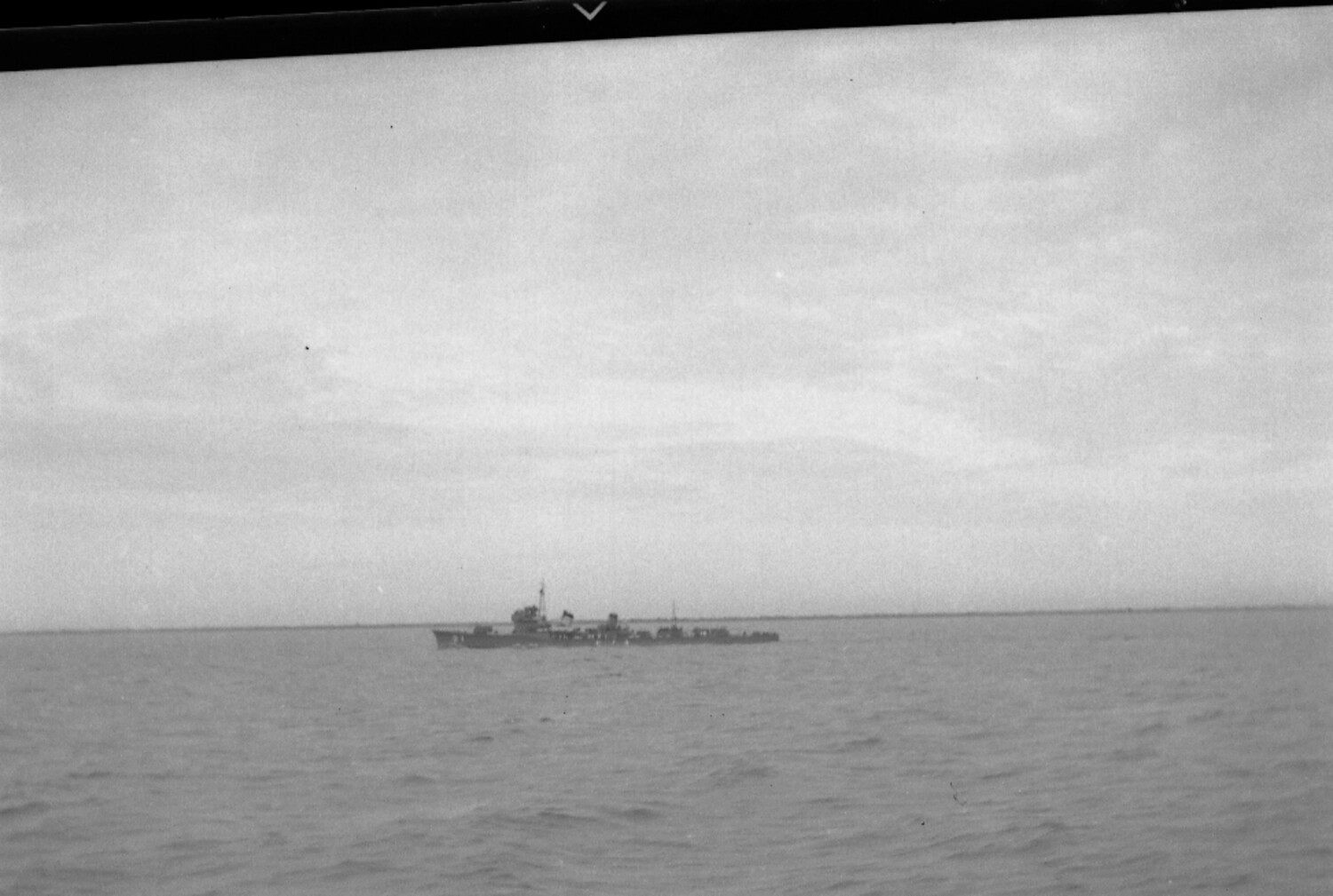 Distant Warship at Sea, Viewed from Shipboard