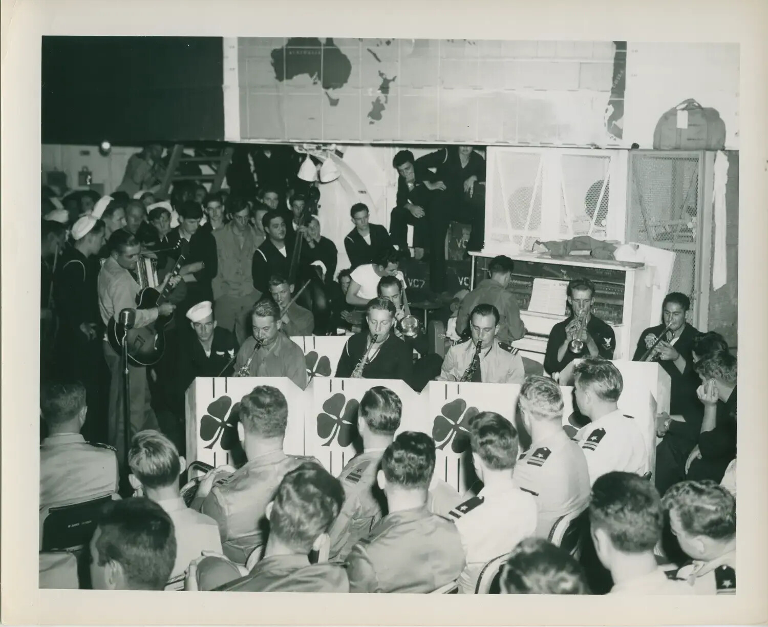 Crew Dance Band Performance in Hangar Bay, USS Petrof Bay (CVE-80), with VC-7 Squadron Markings