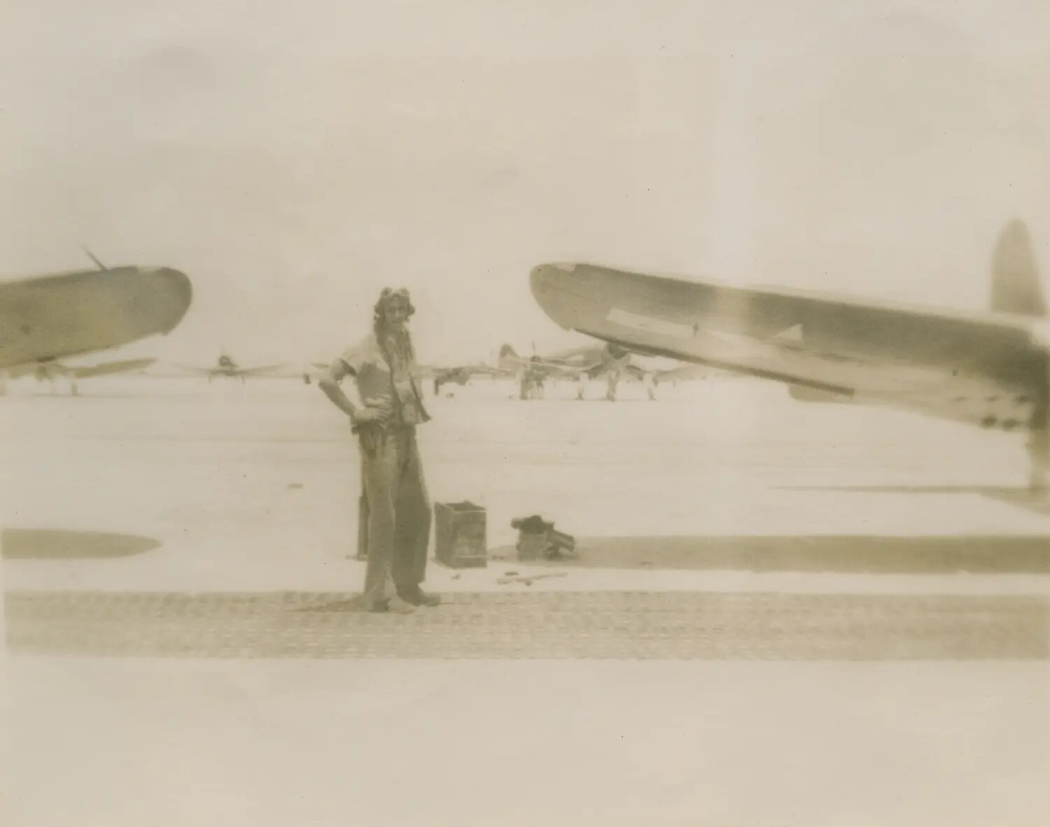 Aviator Standing on Flight Line Between Aircraft Wings, WWII-Era Personal Portrait (Edward P. McAleer Collection)