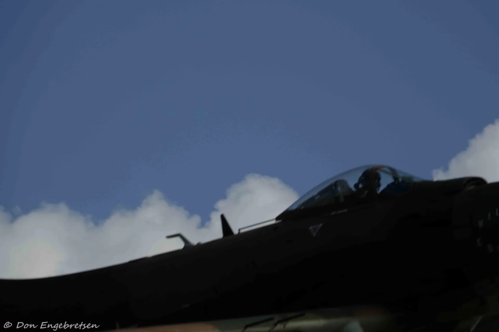 Silhouetted Warbird Cockpit at Commemorative Airshow Event, May 2019
