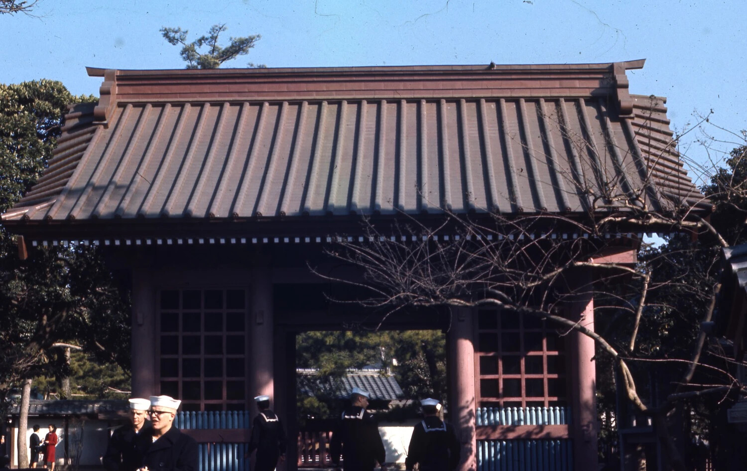 U.S. Navy Sailors at Japanese Temple Gate During Shore Leave