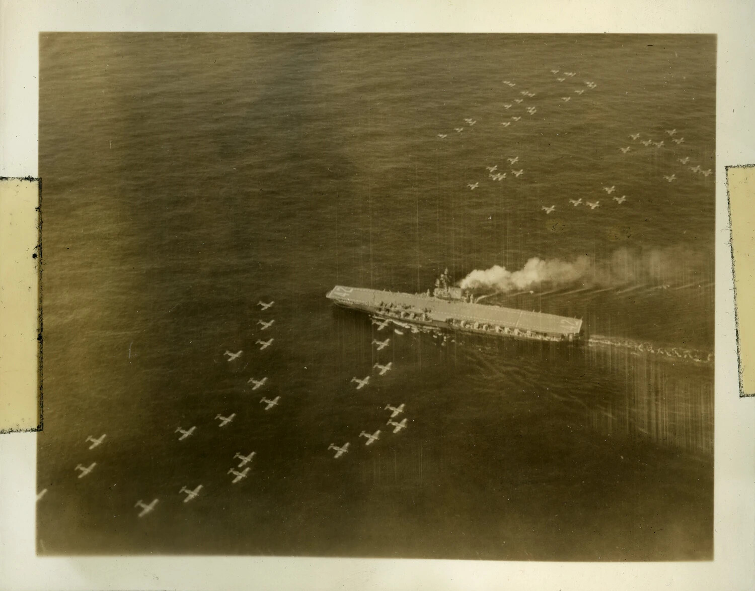 Aerial View of USS Franklin D. Roosevelt (CVB-42) with Overflying Air Group