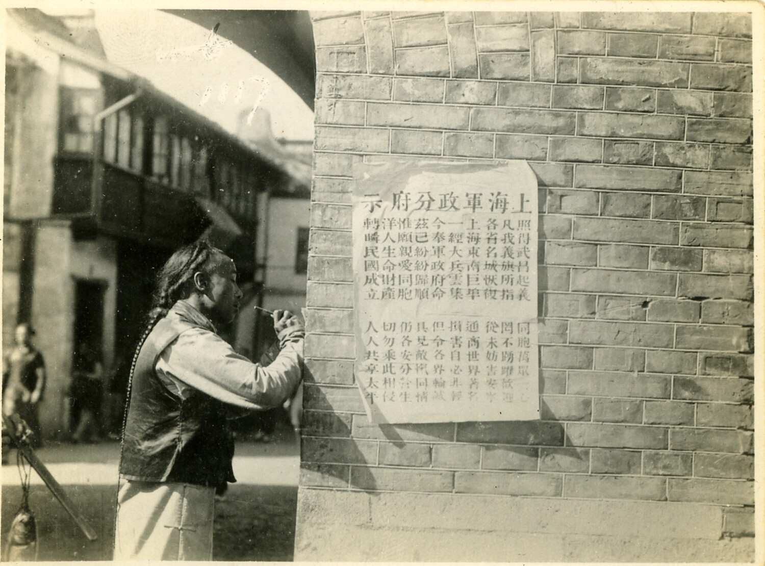 Man Reading a Shanghai Military Government Proclamation, China, c. 1911-1912