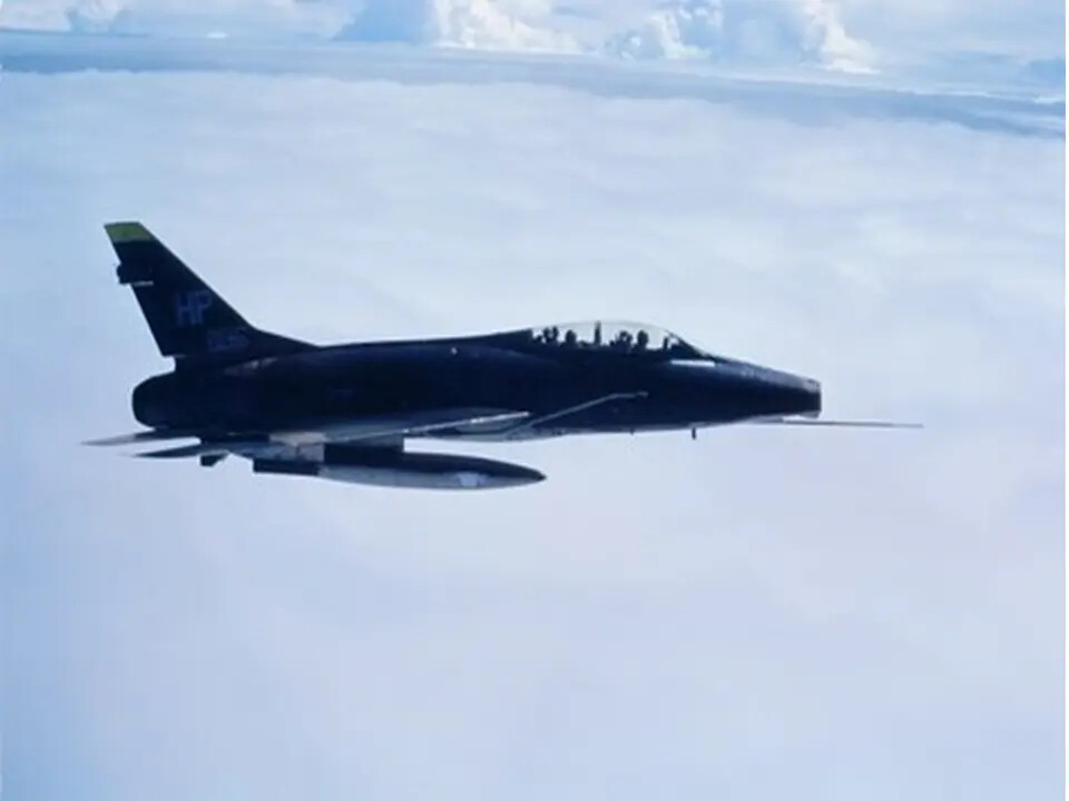 USAF North American F-100F Super Sabre in Flight Above a Cloud Deck
