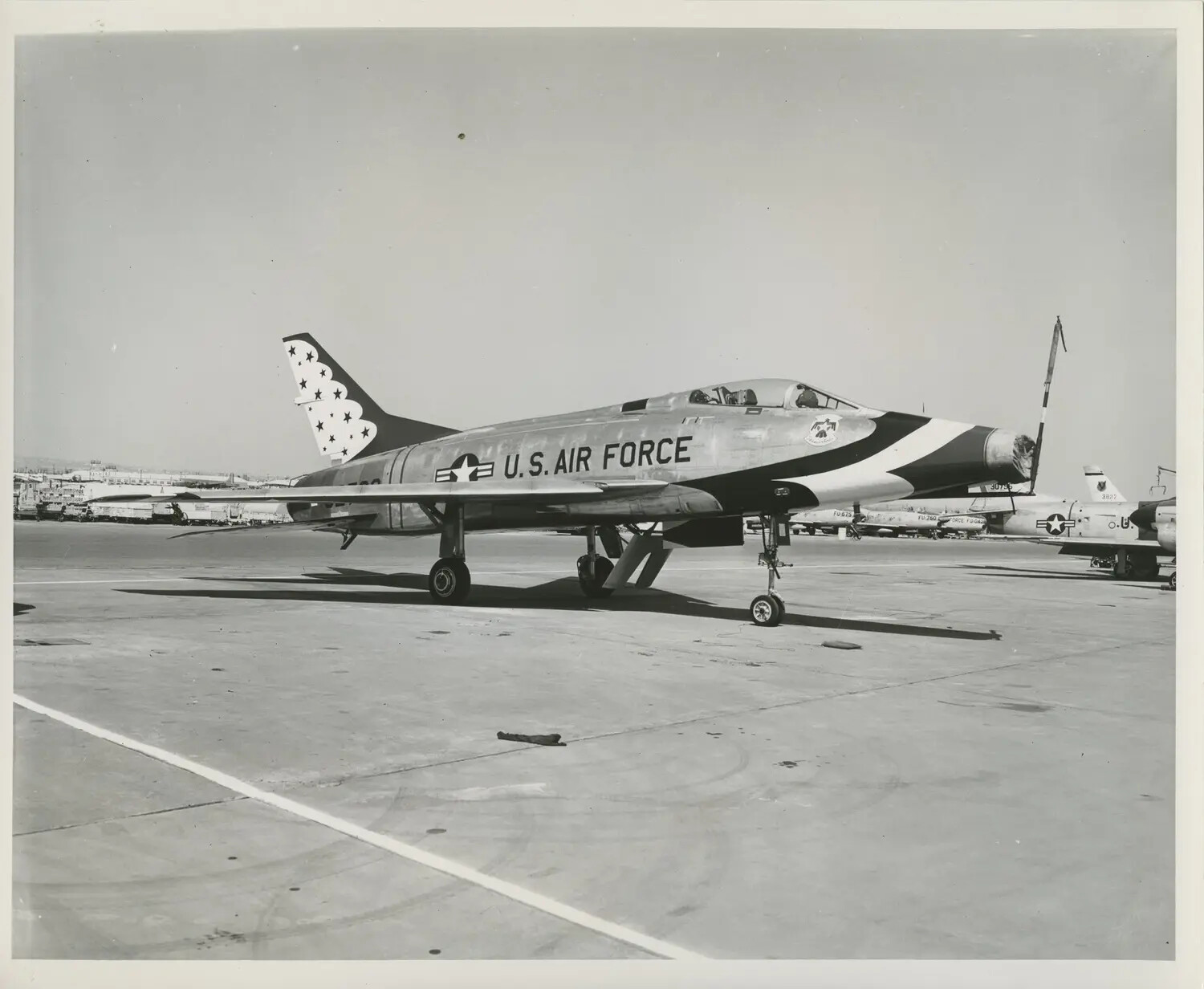North American F-100 Super Sabre with Star-Pattern Tail on Airfield Ramp