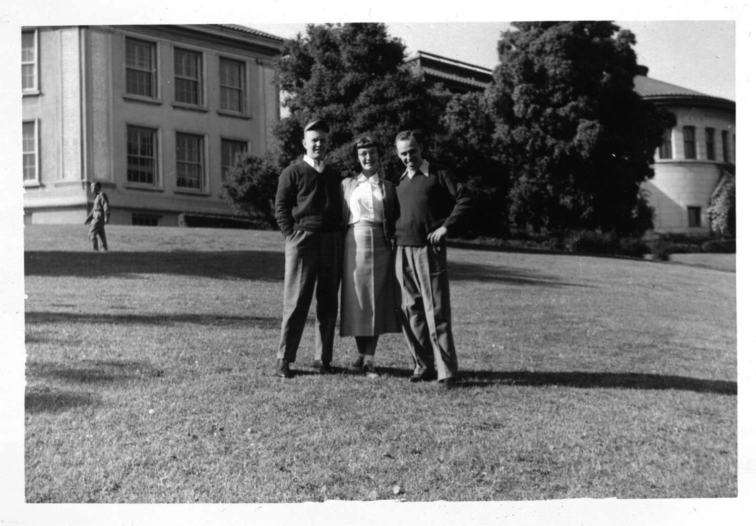 Three Young Adults on a College Campus Lawn, Bancroft Collection