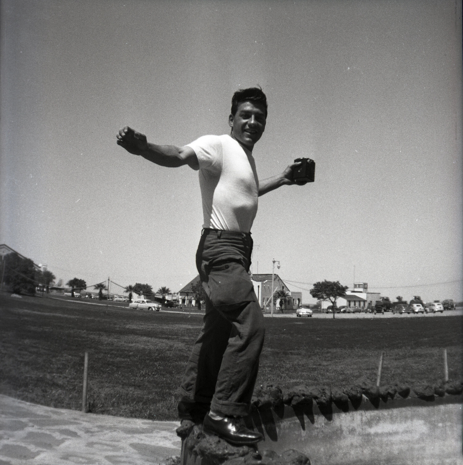 Serviceman Balancing on a Wall with Box Camera, Glenn Haidet Collection, c. early 1950s