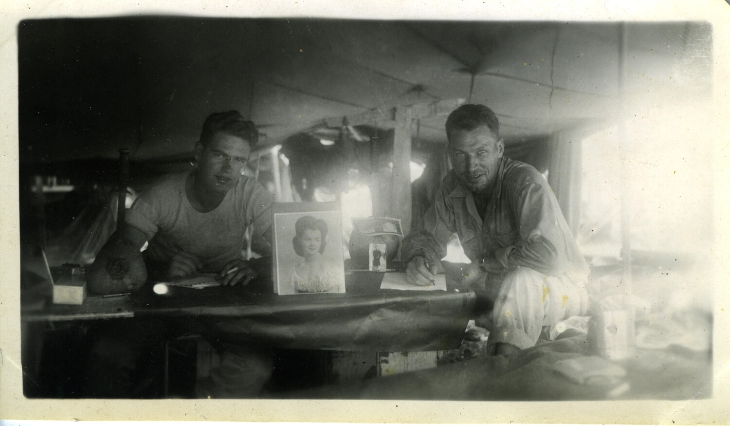 Servicemen Writing Letters in Tent, Pacific Theater, World War II