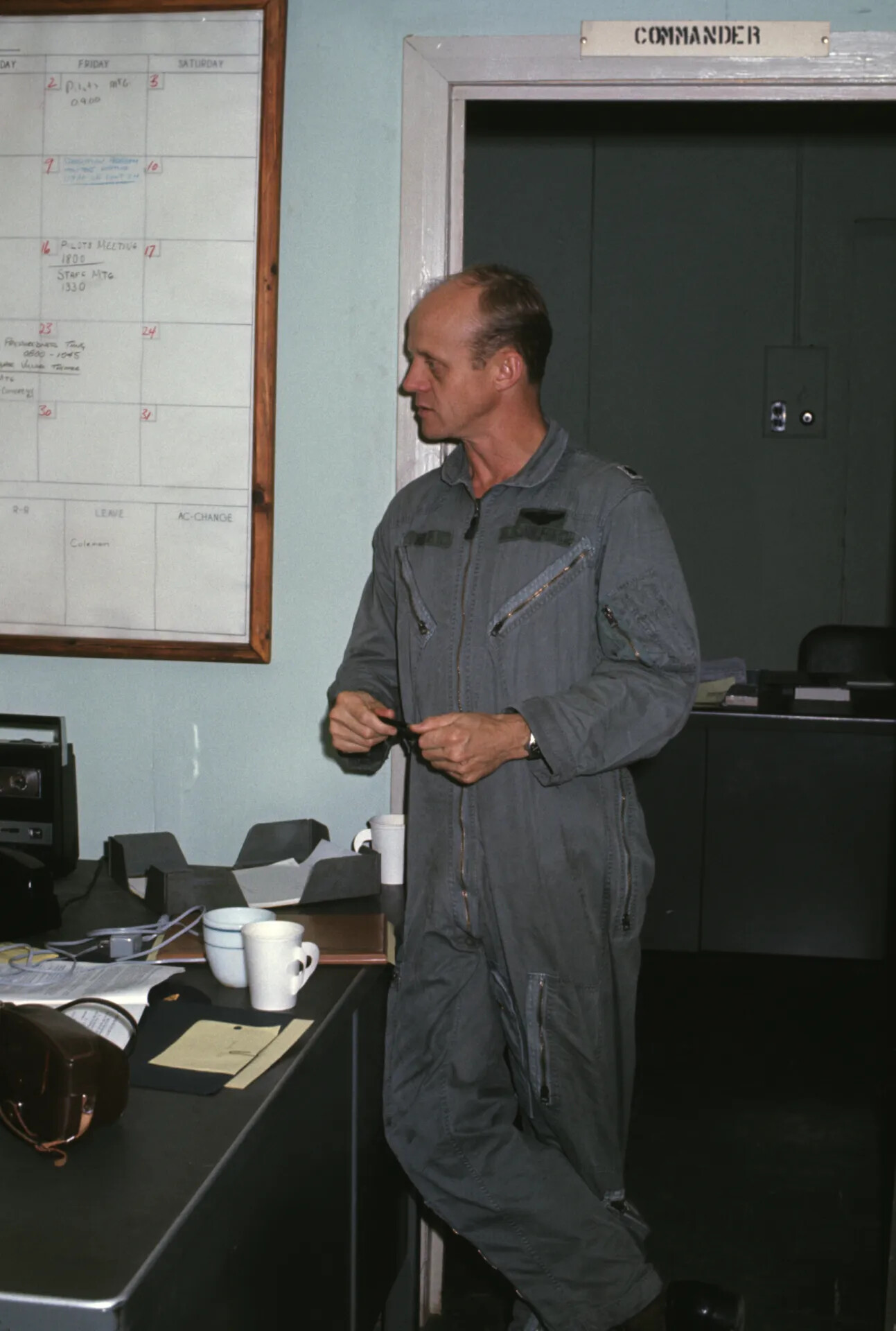 USAF Pilot in Flight Suit Outside Squadron Commander's Office, Vietnam War Era