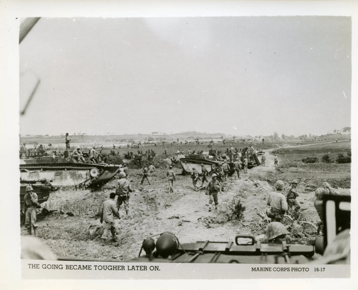 Marines Advance Inland from Amtracs Through Muddy Terrain, Battle of Okinawa, 1945