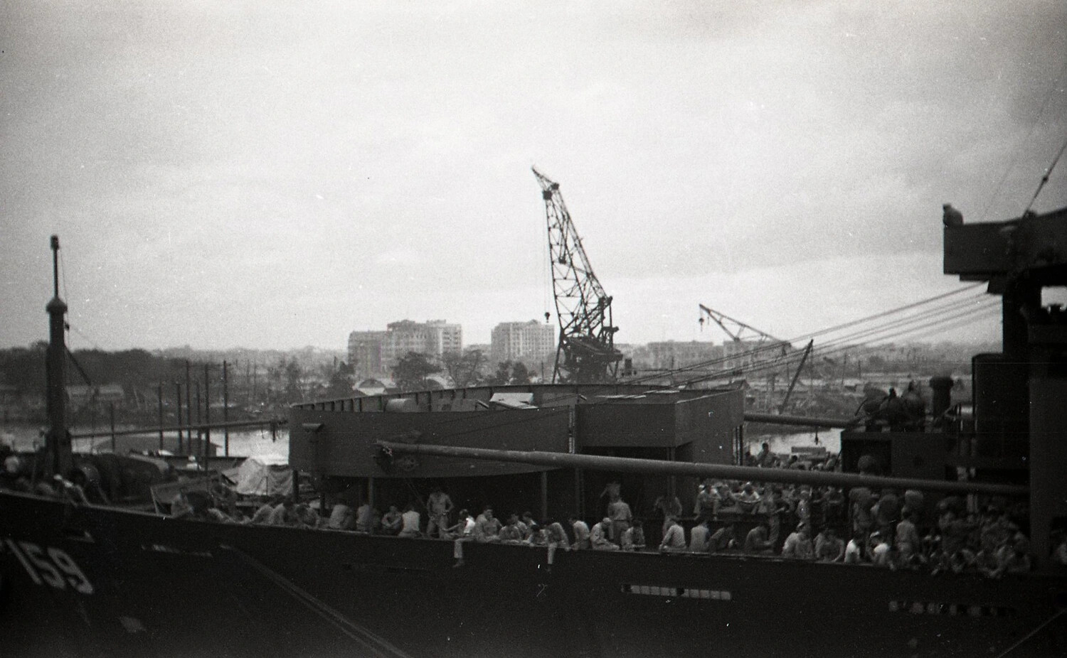 Crew of U.S. Navy Patrol Craft P 159 Relaxing on Deck in Manila Harbor, Philippines, World War II