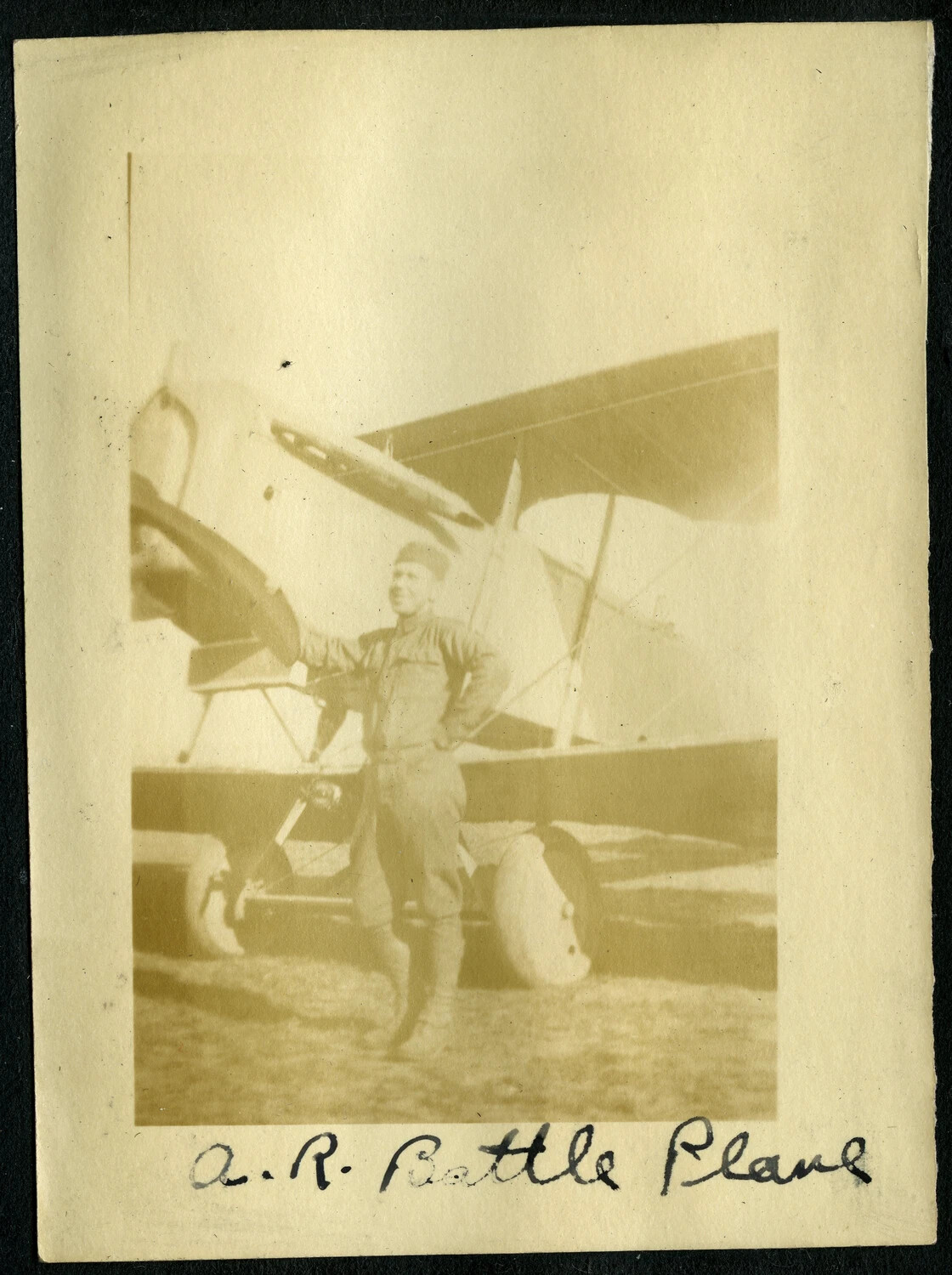 Serviceman Beside Biplane Captioned 'A.R. Battle Plane,' WWI-Era Photo Album, France