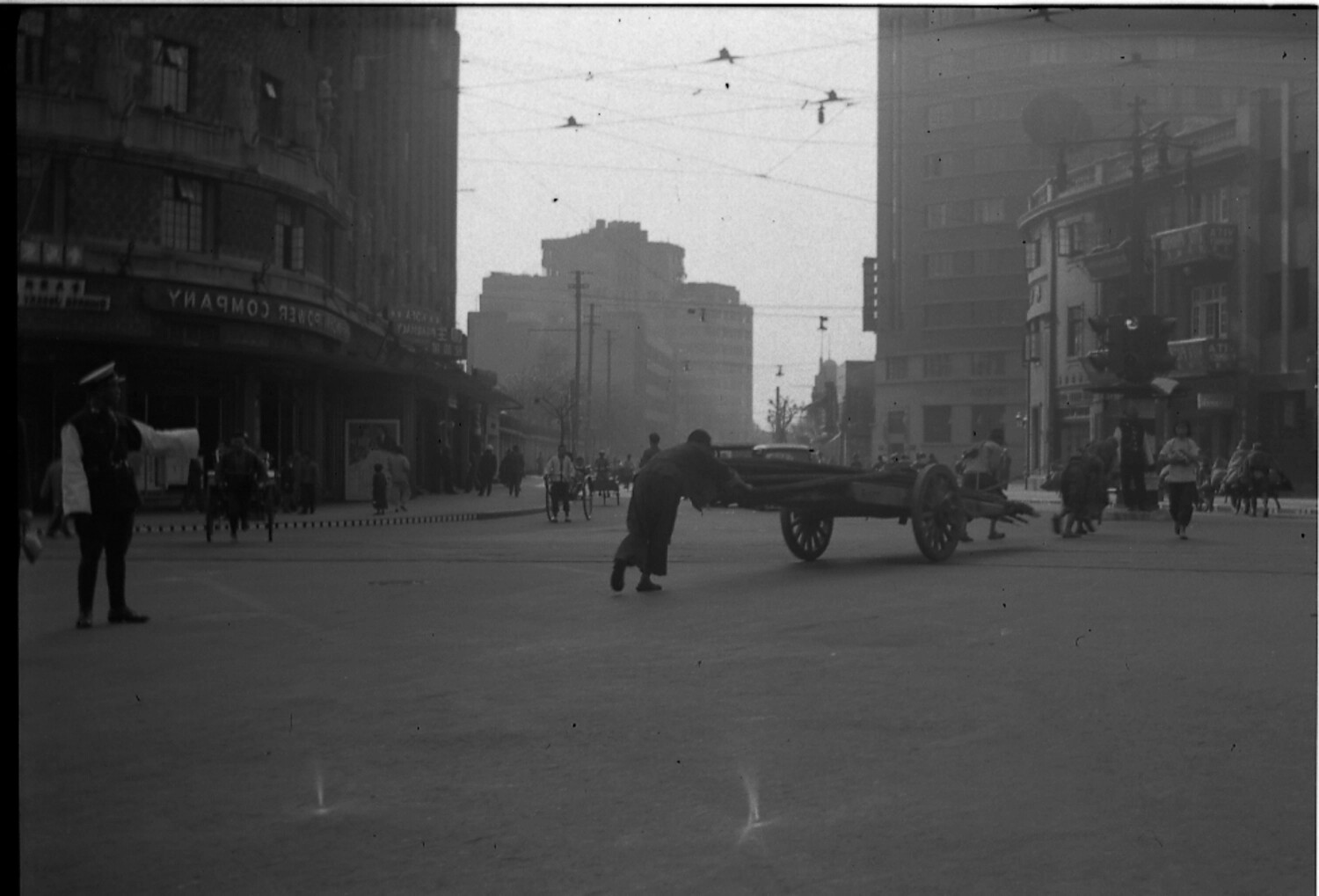 Shanghai Street Scene with Traffic Policeman and Handcart (Negative Scan)