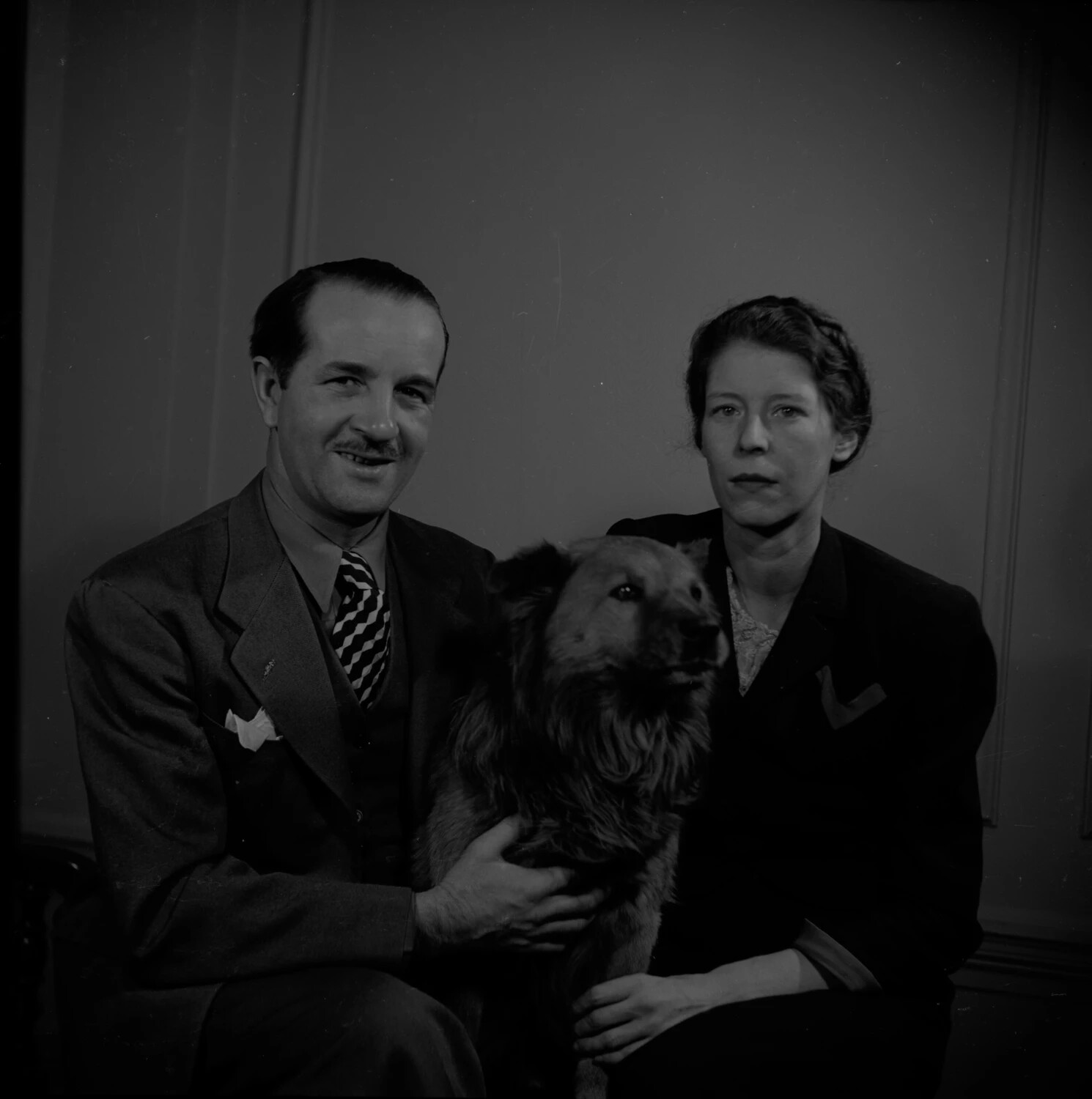 Studio Portrait of a Man and Woman with Large Dog, Mid-20th Century