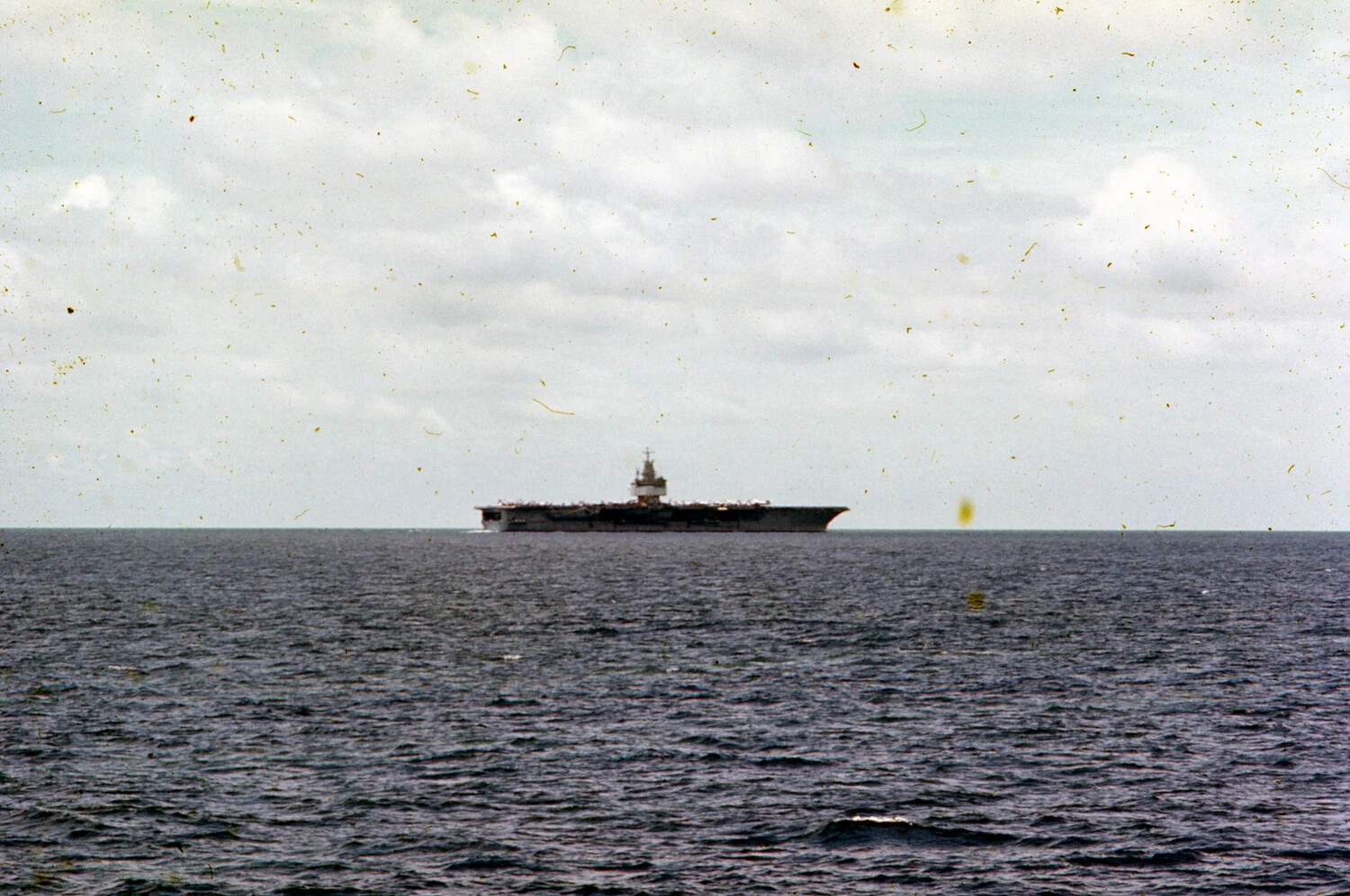 Broadside View of Essex-Class Aircraft Carrier at Sea, USS Ticonderoga, Vietnam War Era