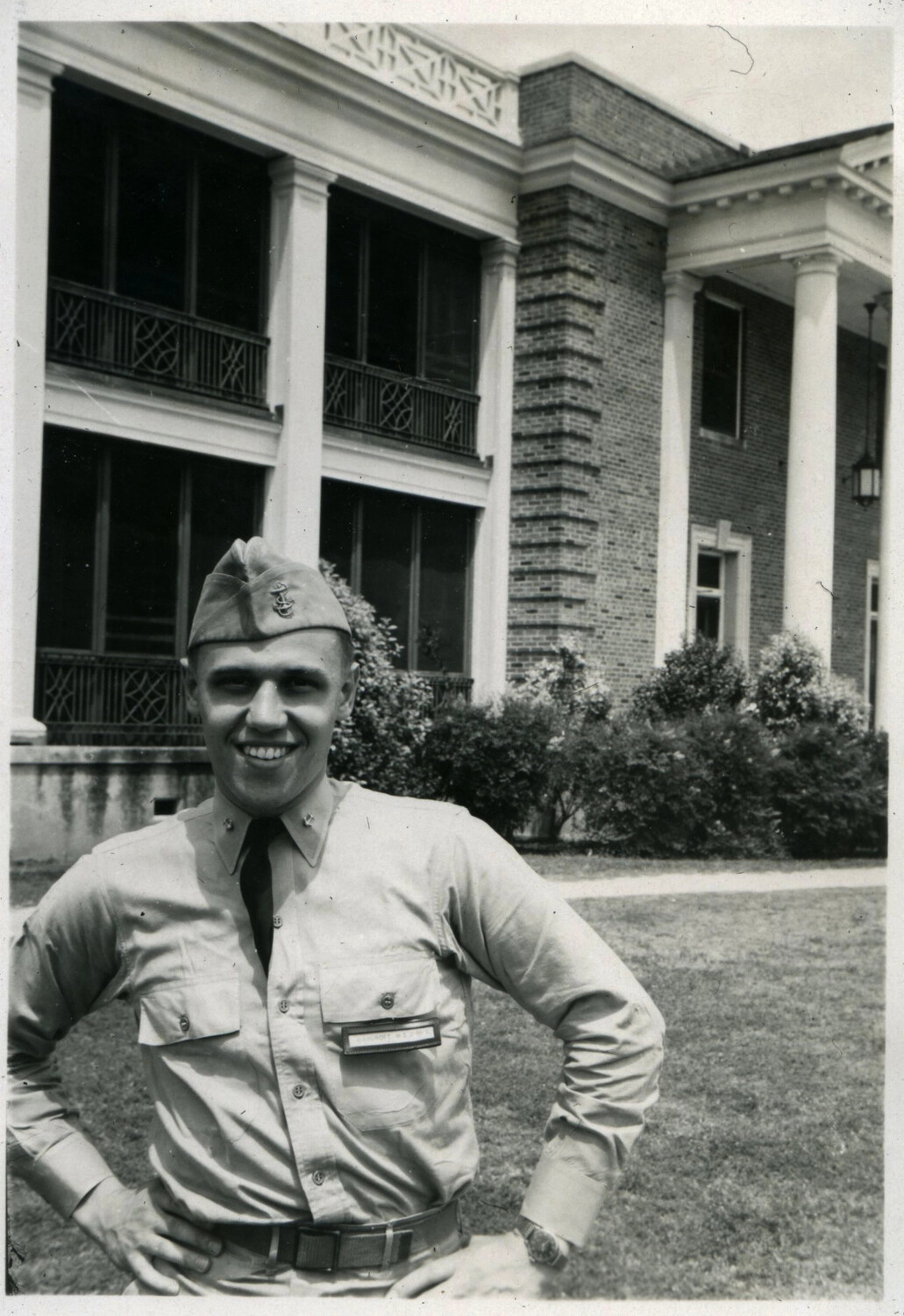 U.S. Navy Sailor Posing Before Colonial-Revival Naval Station Building, Korean War Era