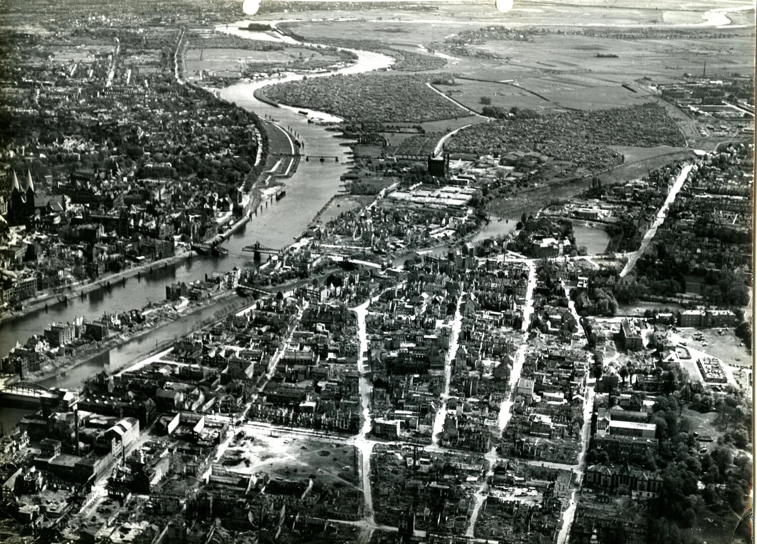 Aerial View of Bomb-Devastated German City Along a River, WWII