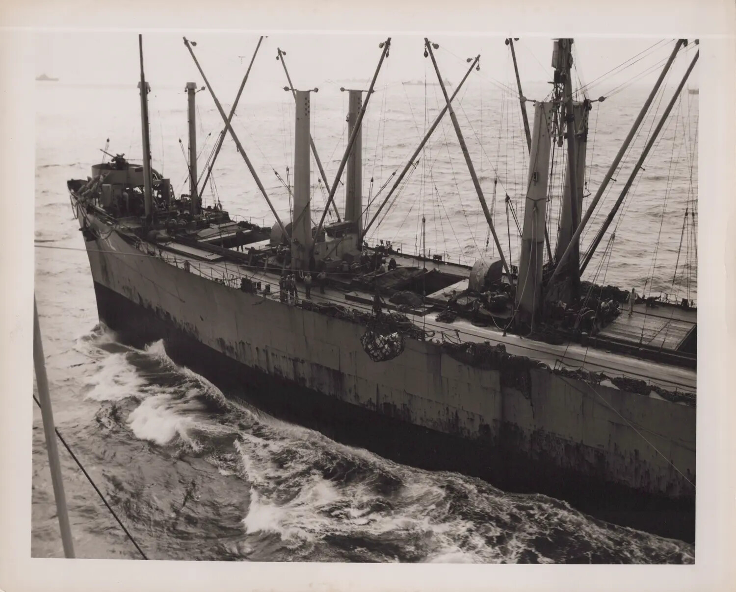Underway Replenishment Alongside USS Petrof Bay (CVE-80), WWII