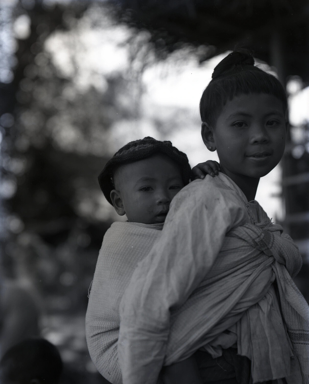 Young Girl Carrying Infant in Cloth Sling, China-Burma-India Theater, WWII