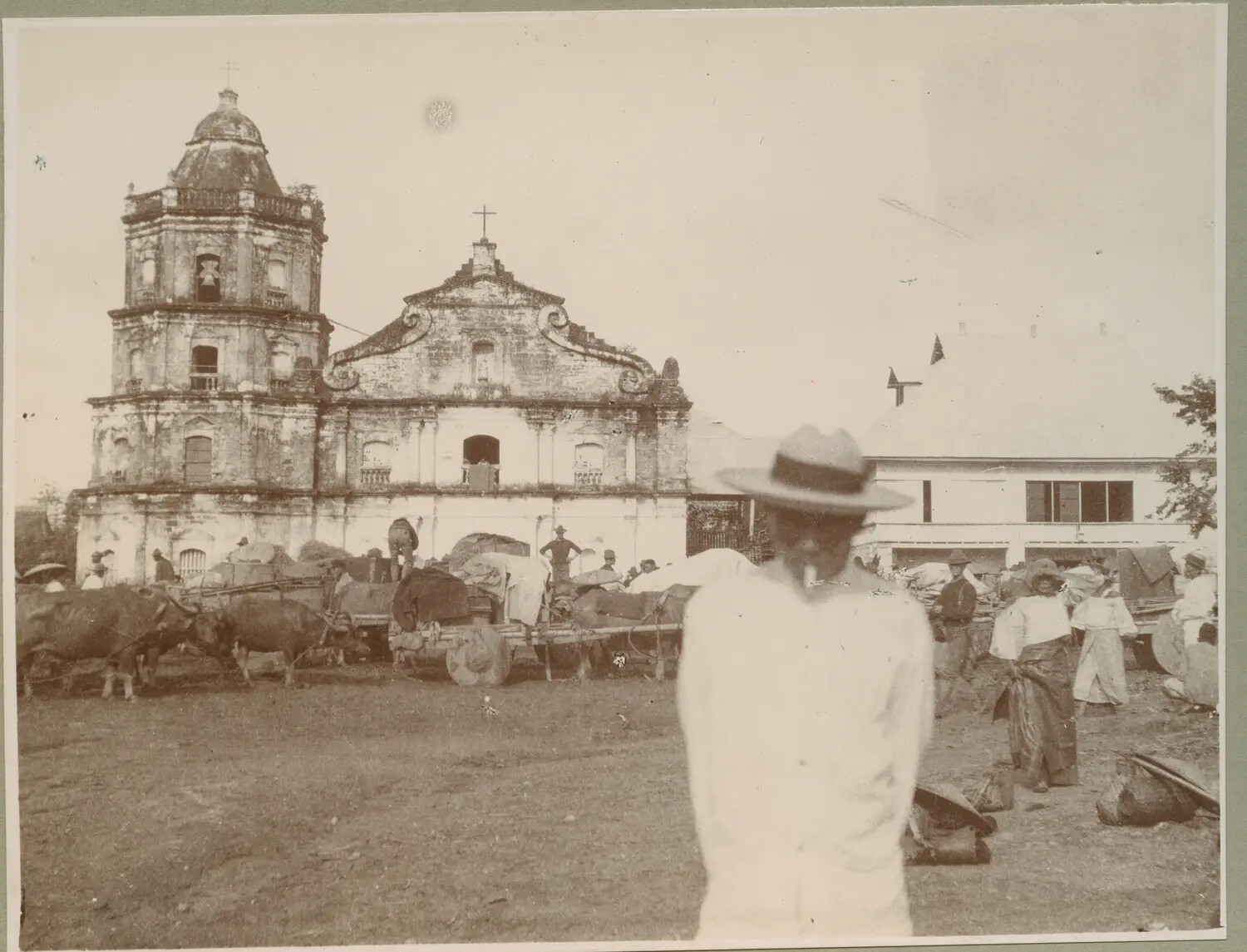 Spanish Colonial Church and Carabao Carts in Philippine Town Plaza, circa 1890s-1900s