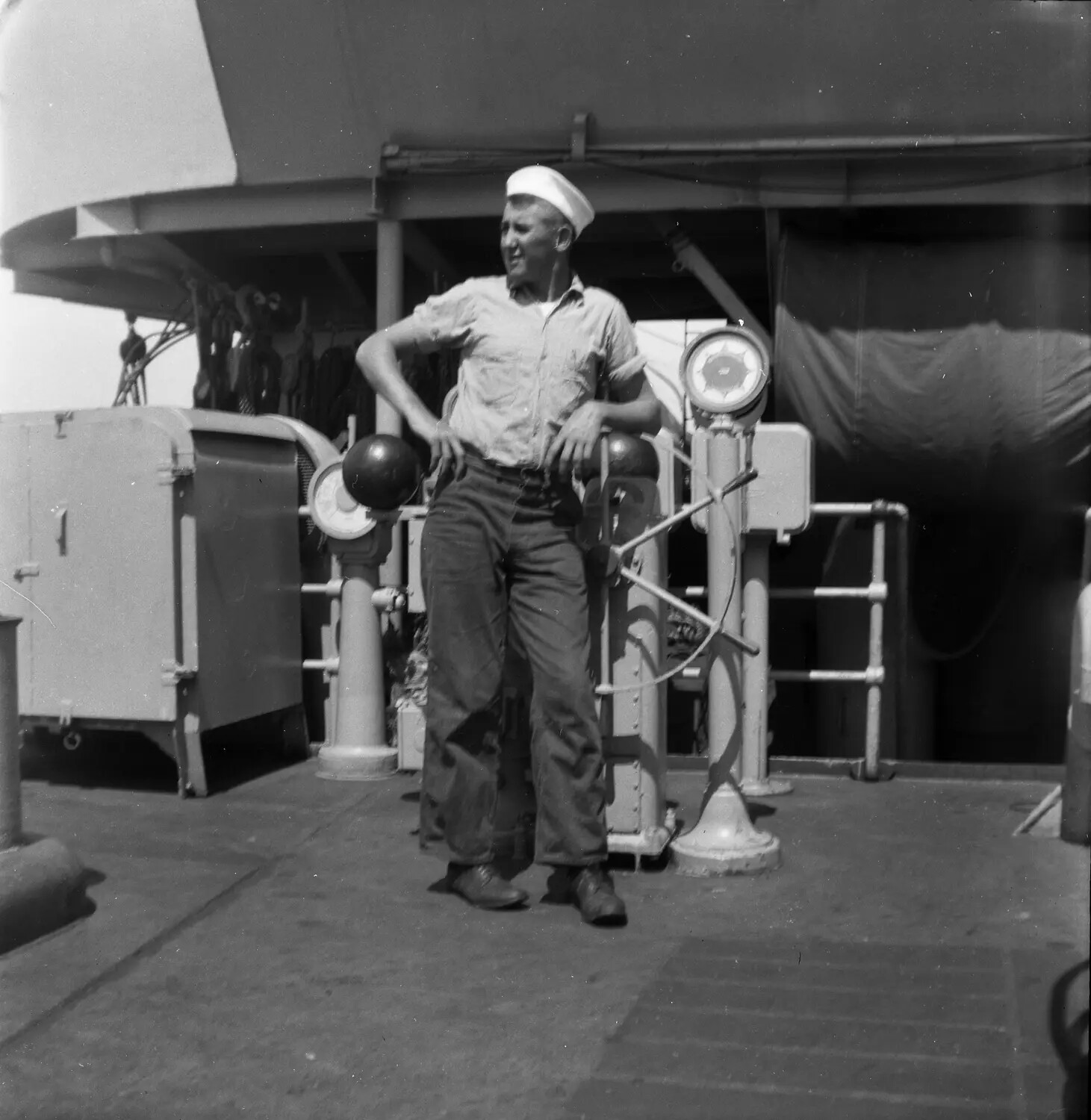 U.S. Navy Sailor Posing on Ship's Deck, Sasebo, Japan