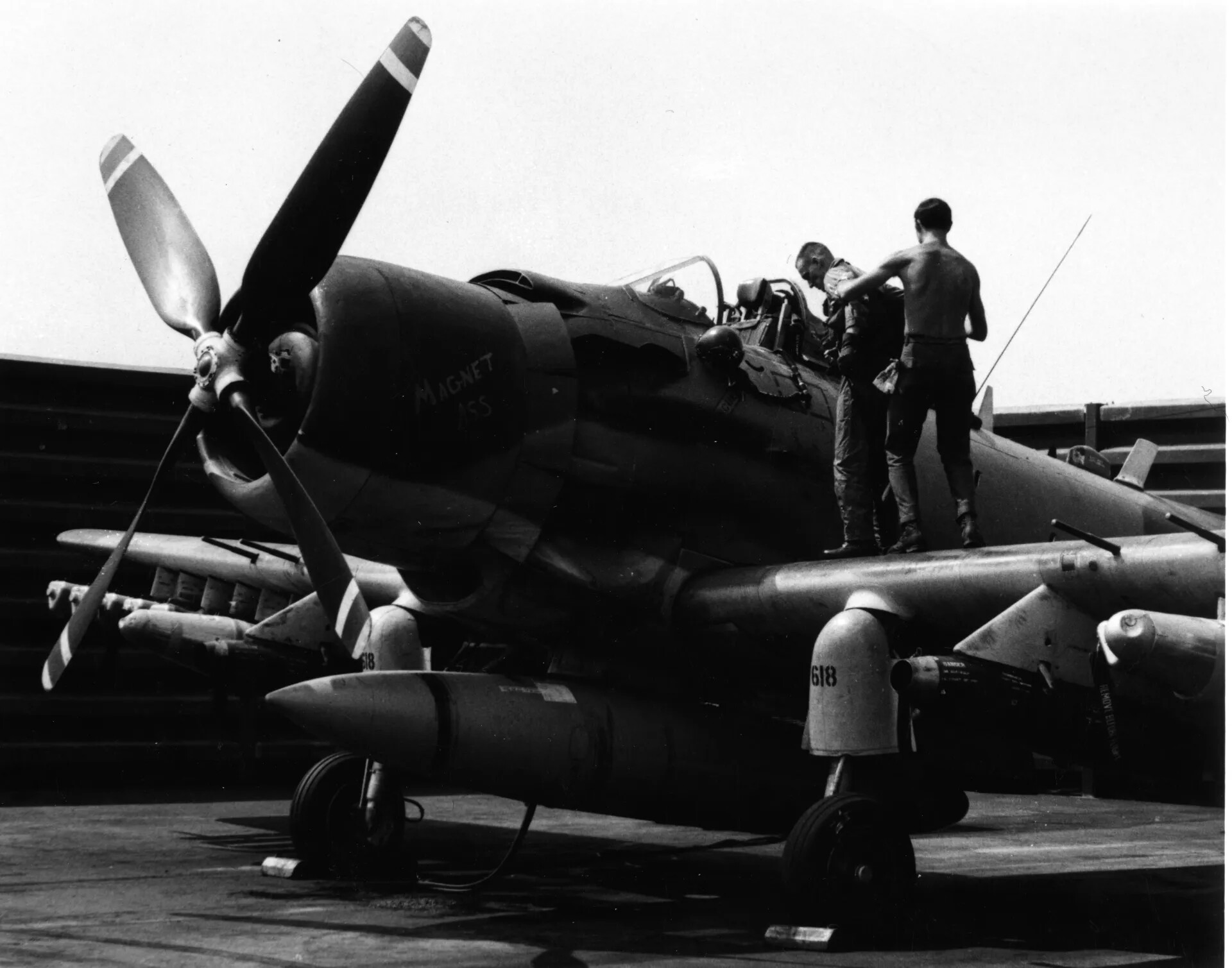 Ground Crewman Assists Pilot in A-1 Skyraider "Magnet Ass" (618) Cockpit, Vietnam War