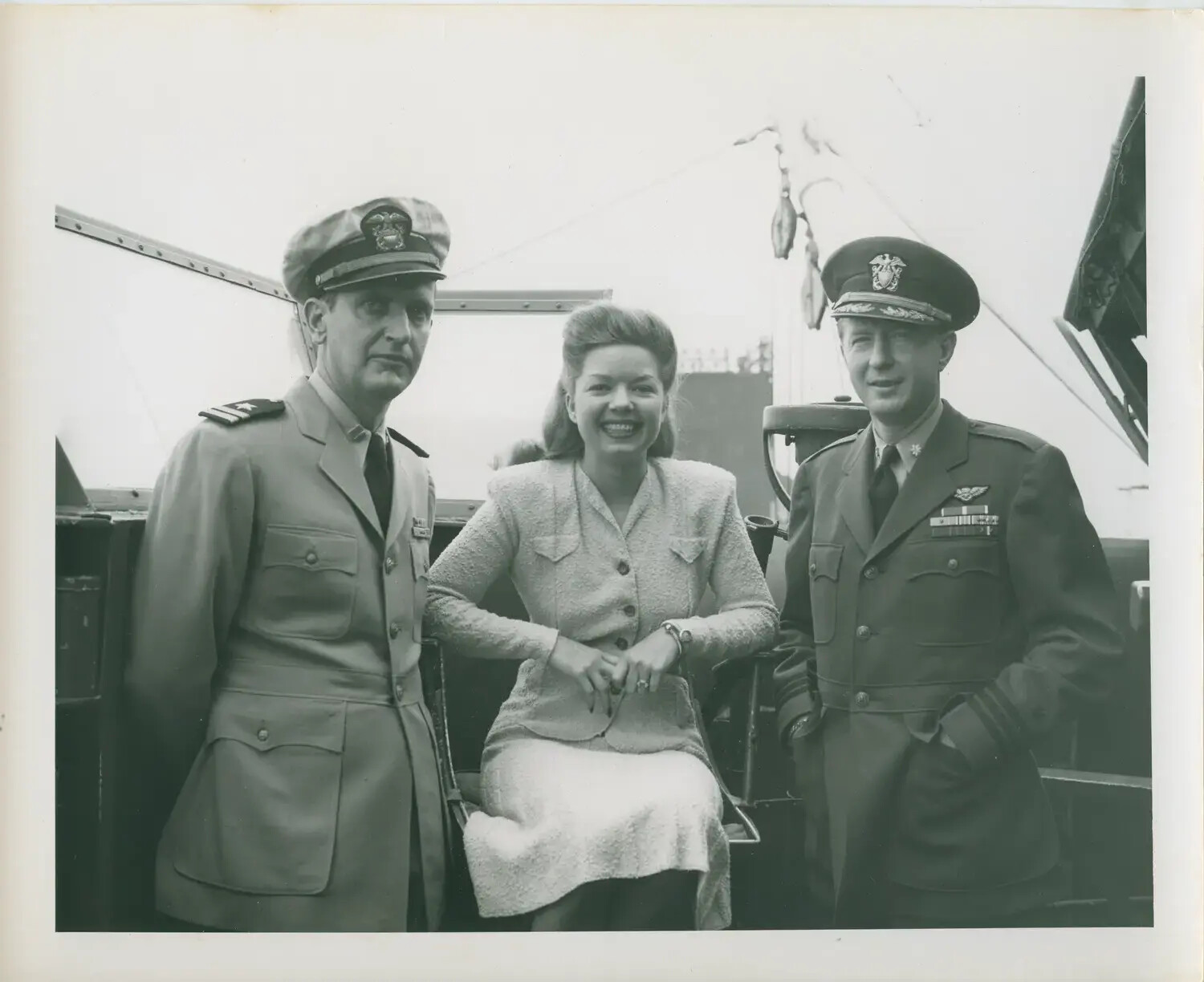 Naval Officers and Civilian Woman Aboard USS Petrof Bay (CVE-80) - Formal Group Portrait