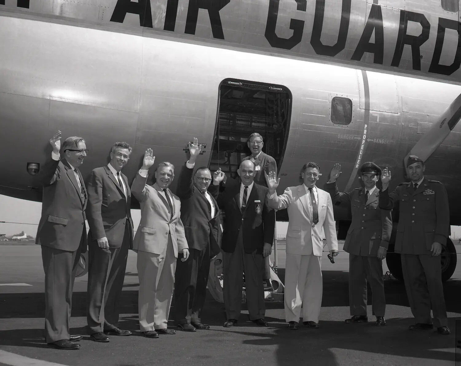California State Assemblymen and Air Guard Officers Wave Beside C-97 Stratofreighter, April 1960
