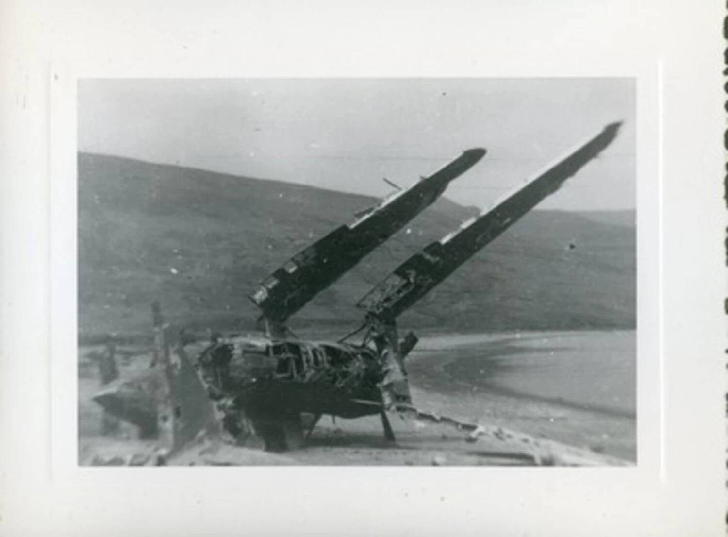 Wreckage of a Twin-Engine Aircraft in Remote Terrain, WWII