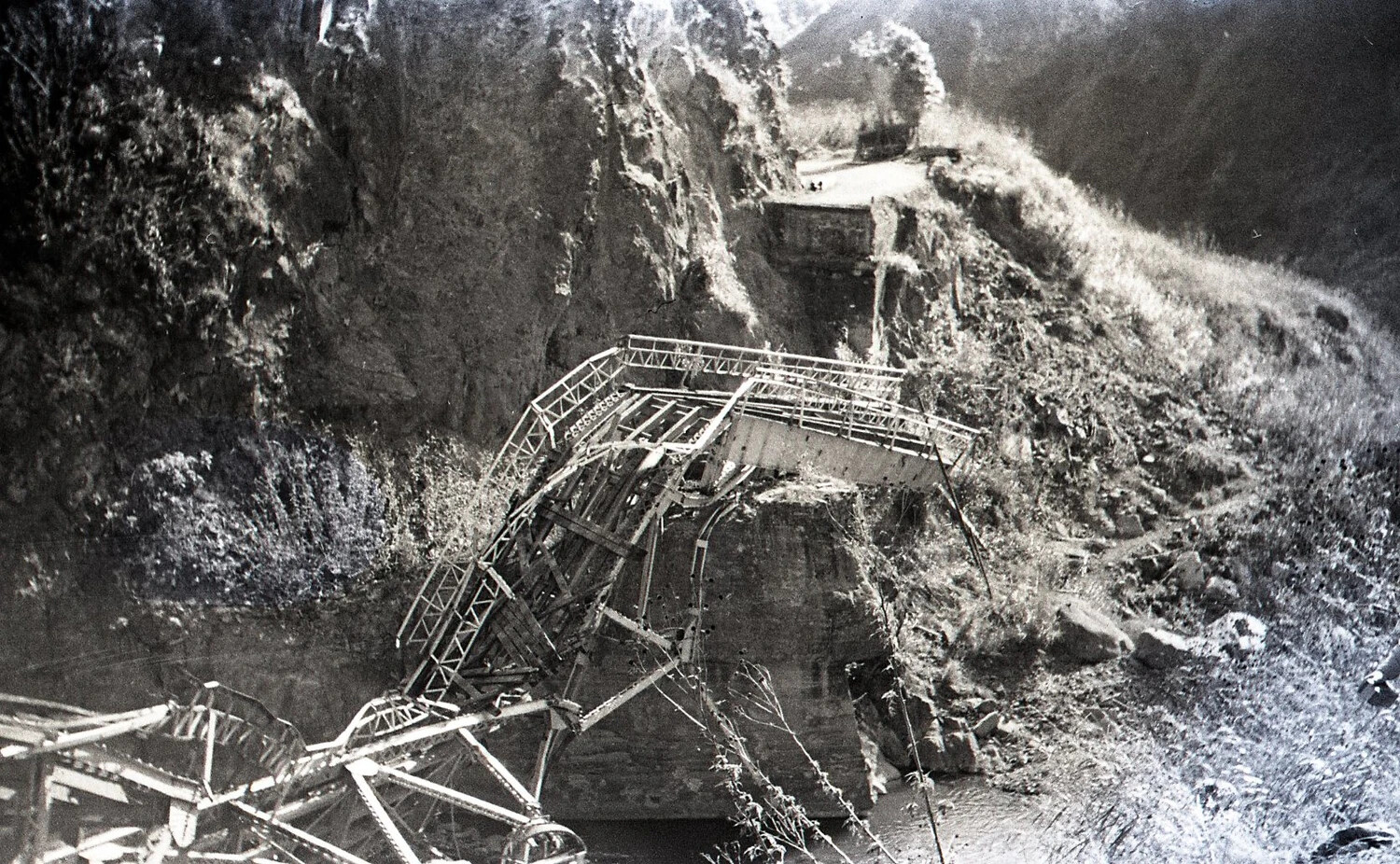 Collapsed Steel Truss Road Bridge over Mountain Ravine, Luzon, Philippines, World War II