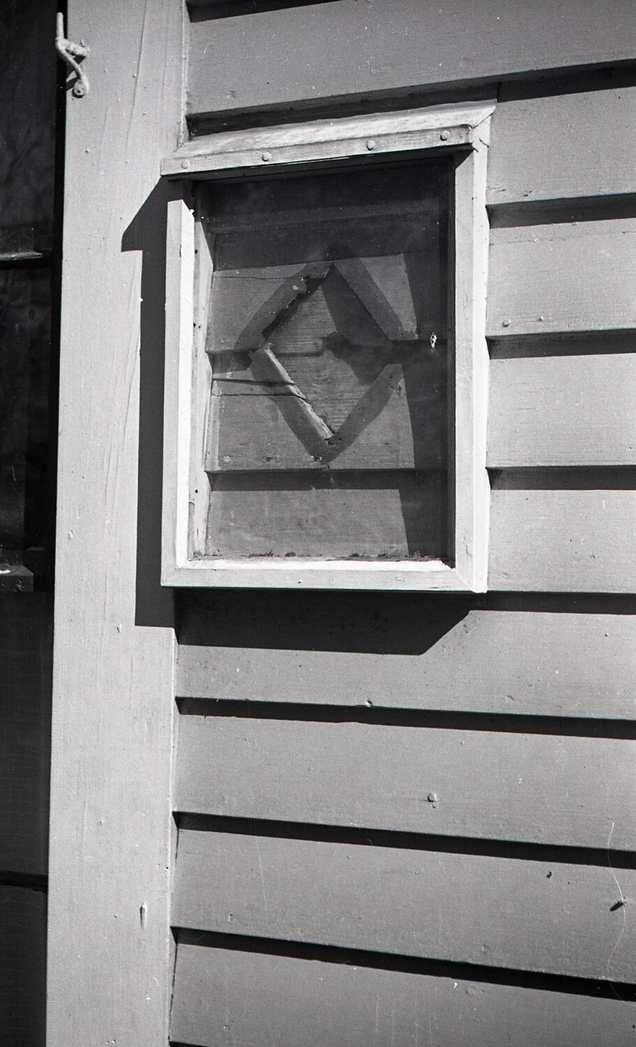 Barn Window Detail with Diagonal Brace, Rural Outbuilding