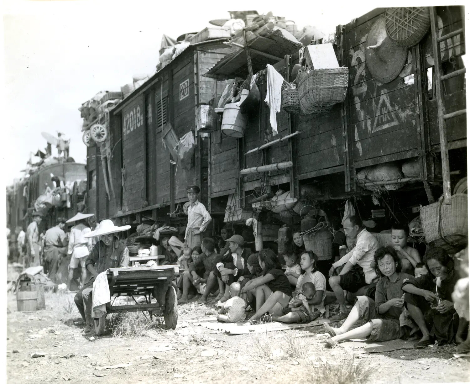 Chinese Civilian Refugees Beside Overloaded Freight Train, China-Burma-India Theater, WWII