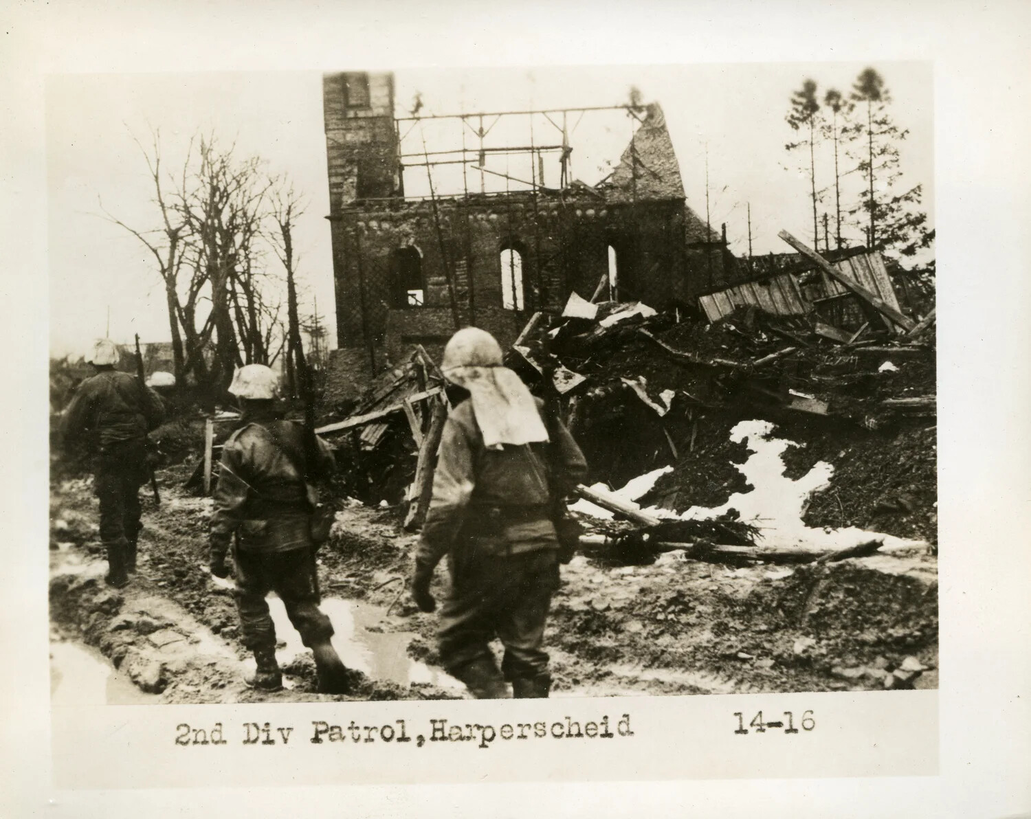 2nd Infantry Division Patrol Moving Through the Ruins of Harperscheid, Winter 1944-1945