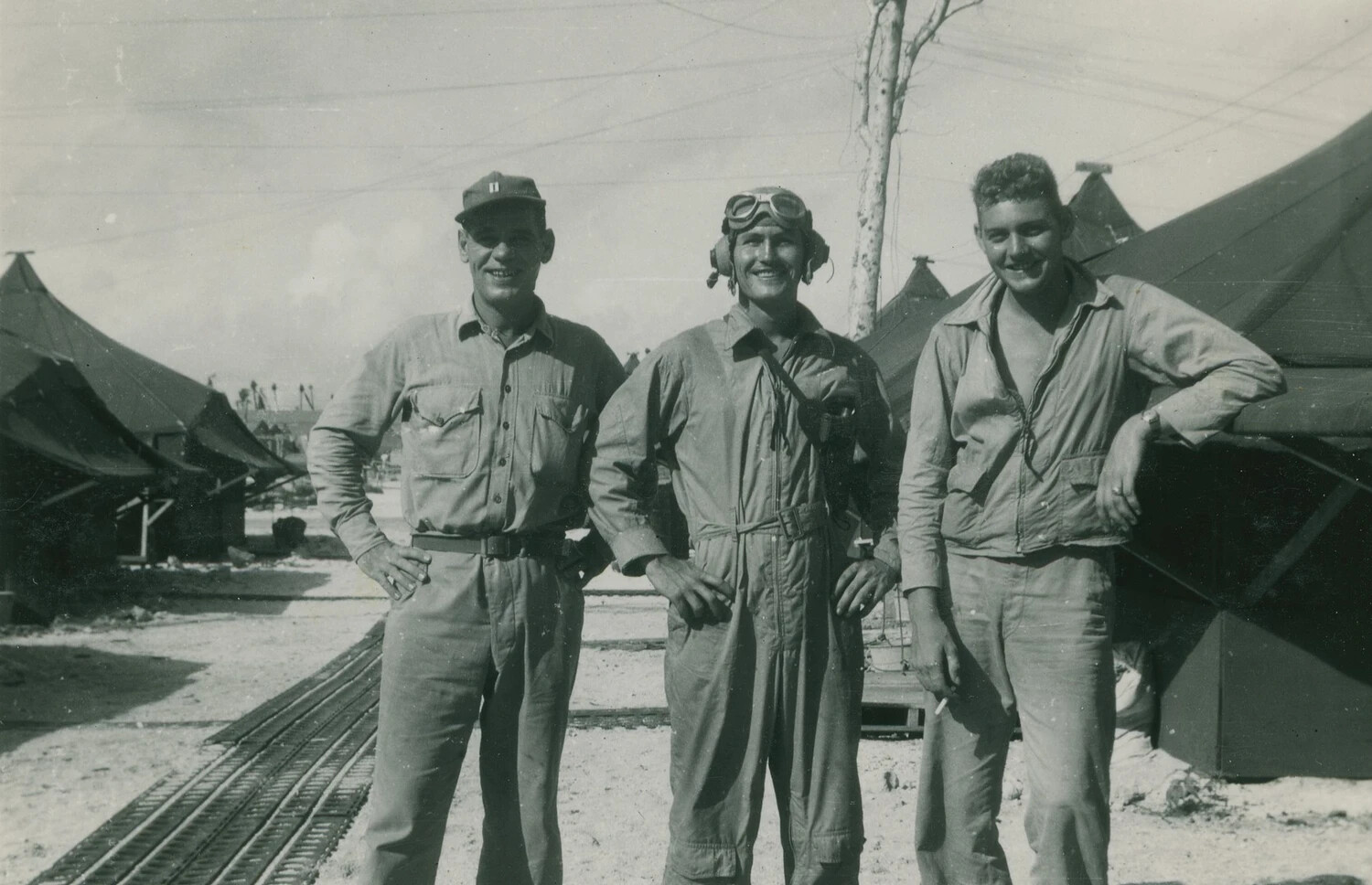Naval Aviator with Two Crewmen at Pacific Island Tent Camp, WWII