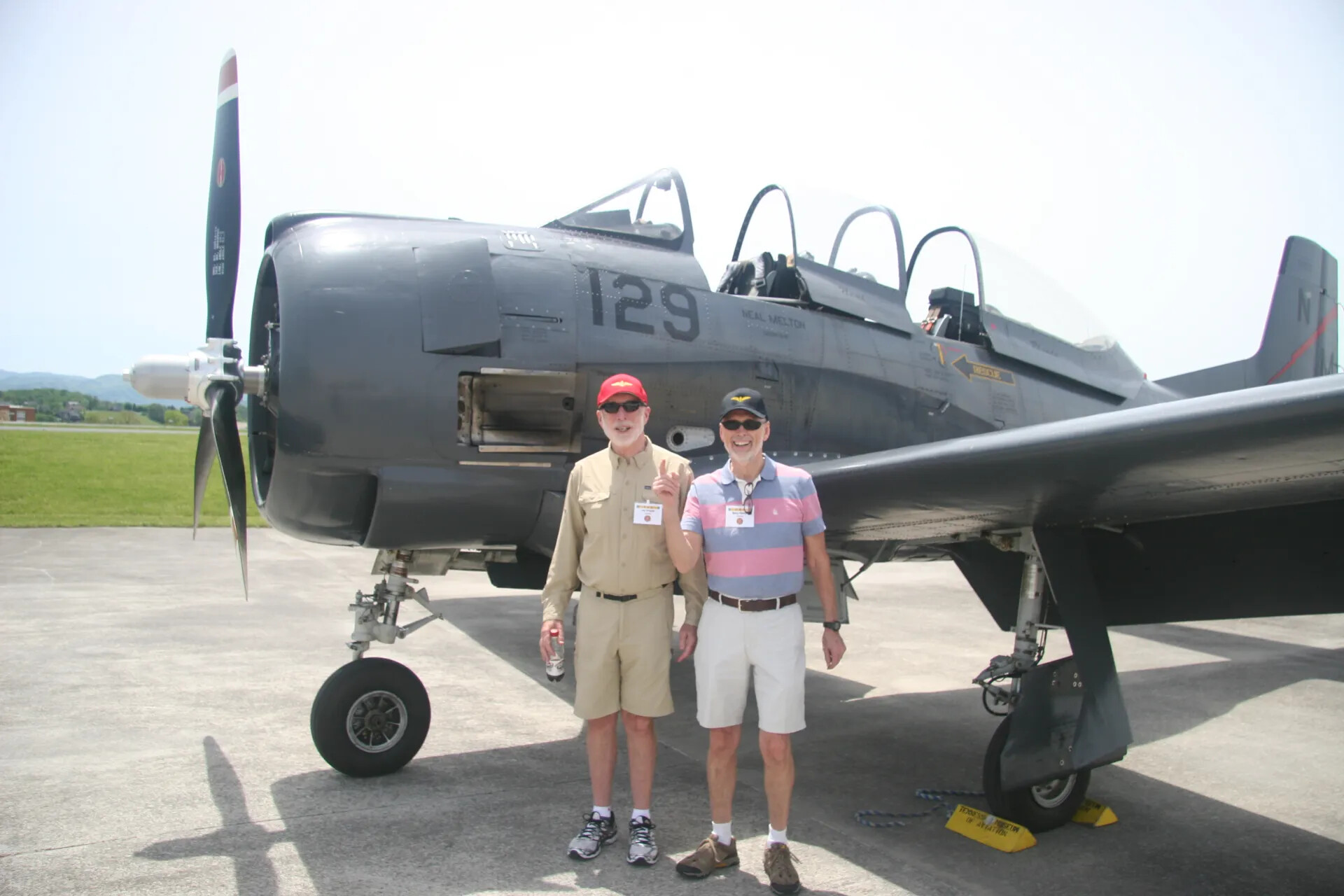 Neal Melton's A-1E/AD-5 Skyraider "129" with Attendees, Reunion Event Ramp