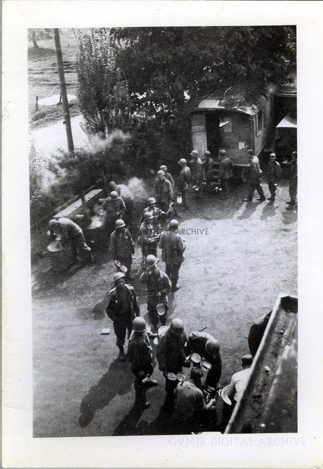 101st Airborne Soldiers in a Chow Line at a Field Kitchen, European Theater, WWII
