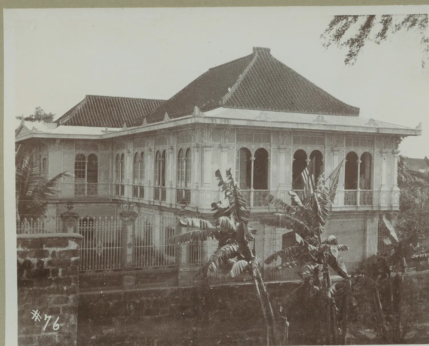 Bahay na Bato Colonial Residence with Flags on Balcony, Philippines, c. 1890s-1900s