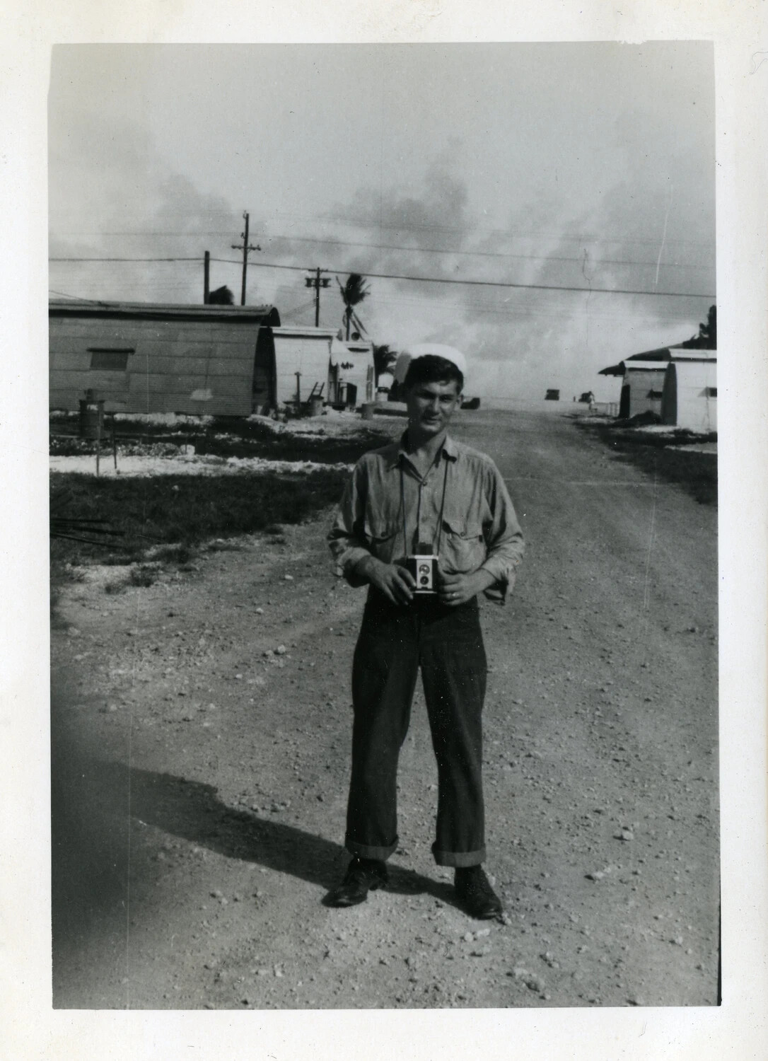 U.S. Navy Sailor with Camera, NATS Squadron VR-6 Base Camp, Agana, Guam