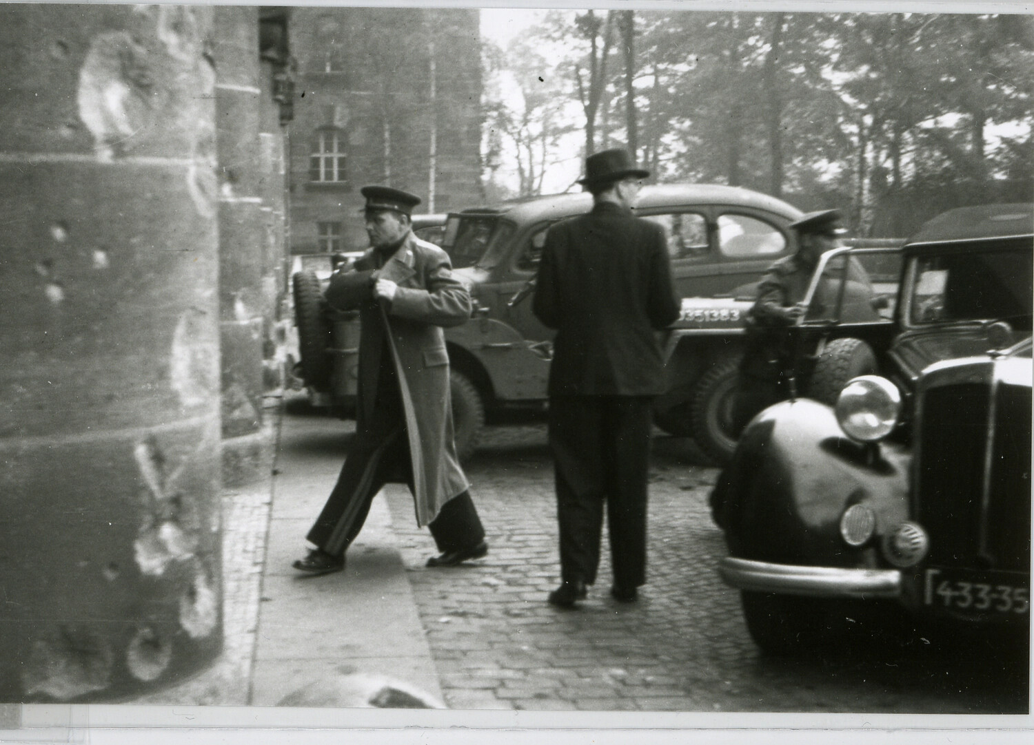 Street Scene with Military and Civilian Figures, Postwar Nuremberg, Germany (Nuremberg Trials Era)